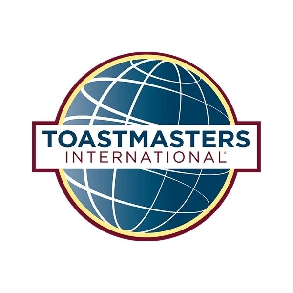 Logo of Toastmasters International featuring a globe with latitude and longitude lines and the words 'Toastmasters International' in the center.