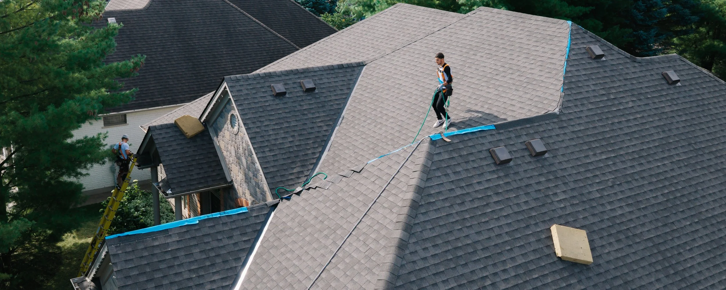 Aerial drone view of a residential roofline from above