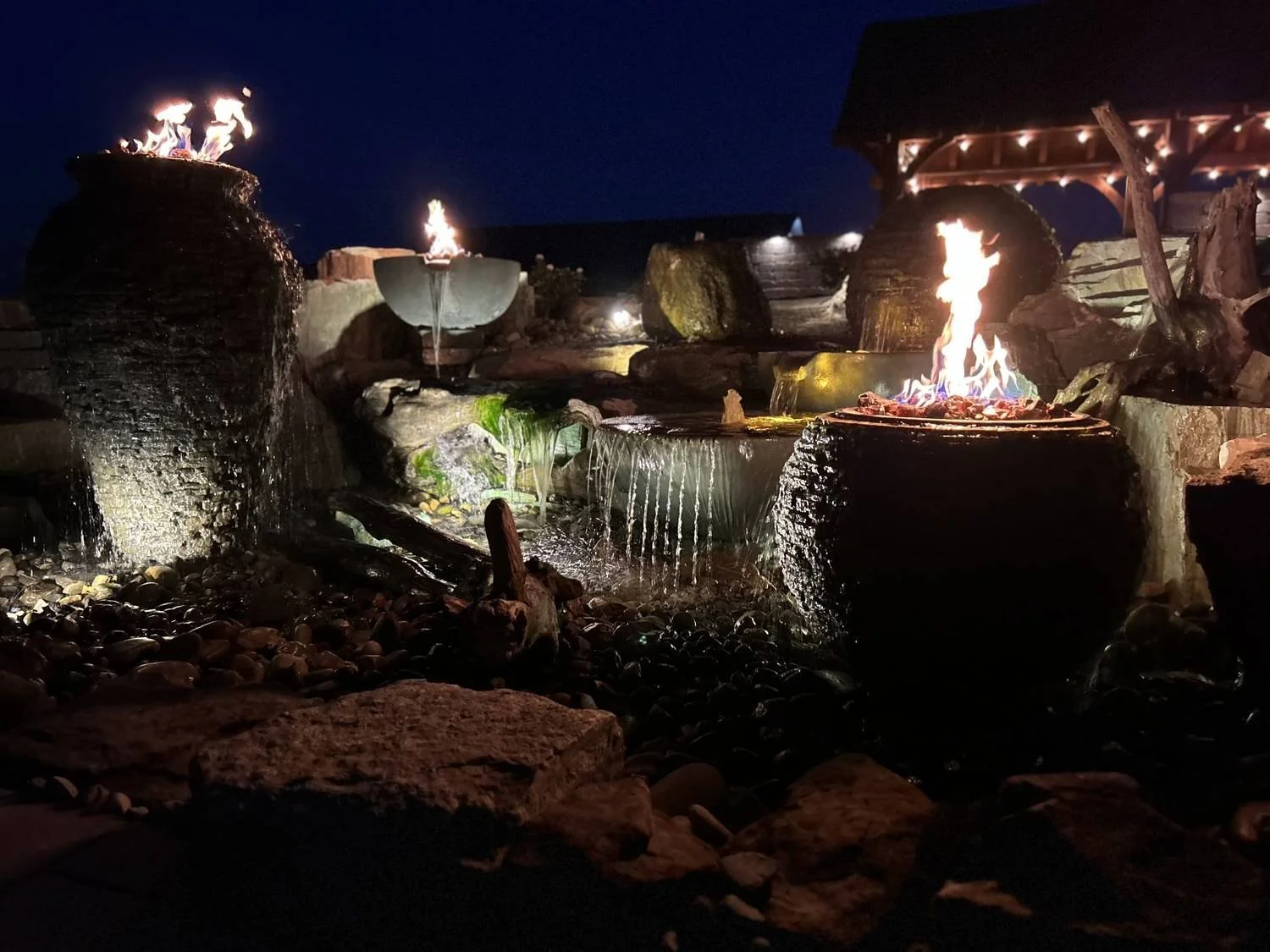 Luck Lagoons luxury pool lighting outdoor living at night