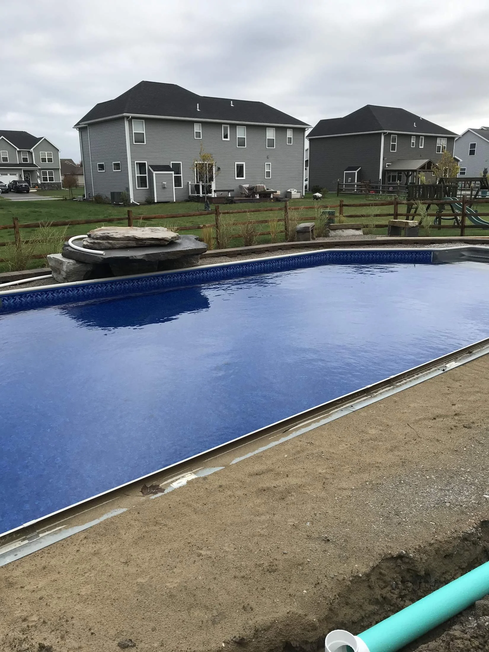 Vinyl-liner pool filled during late fall construction by Luck Lagoons