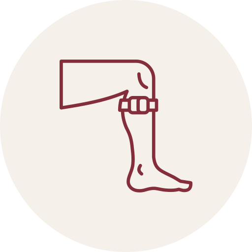 Outline illustration of a leg with a boot and a strap, possibly representing a prosthetic limb.