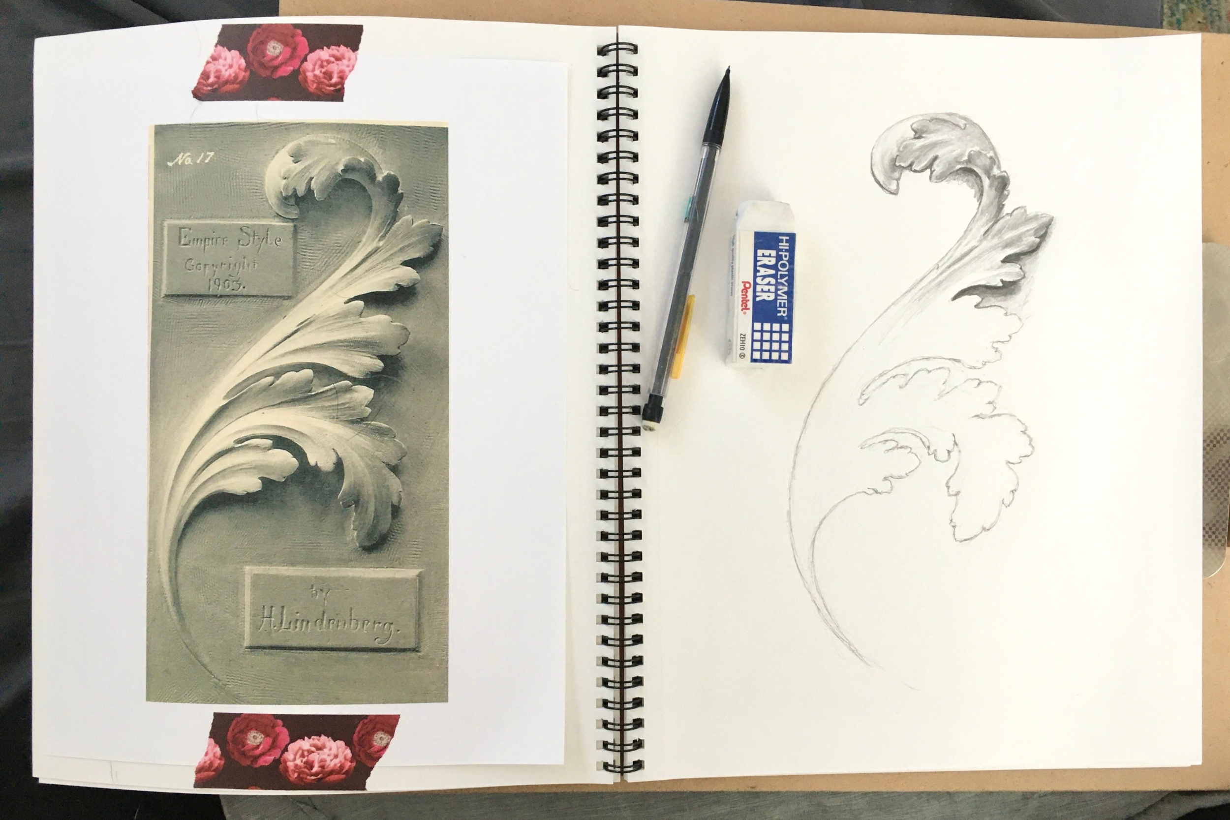Sketchbook spread featuring a drawing of an architectural ornament