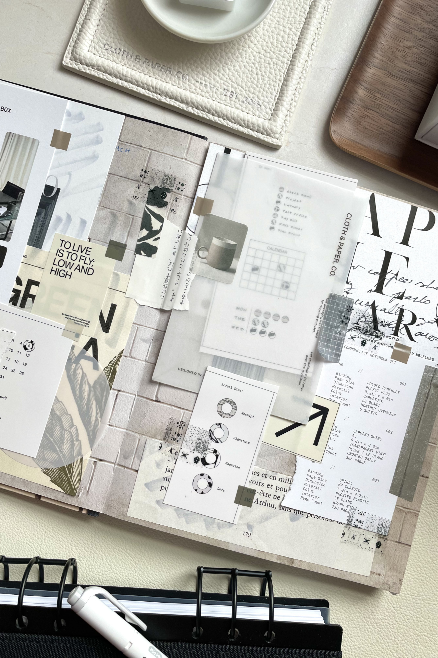 A minimal black and white junk journal spread using discarded packaging