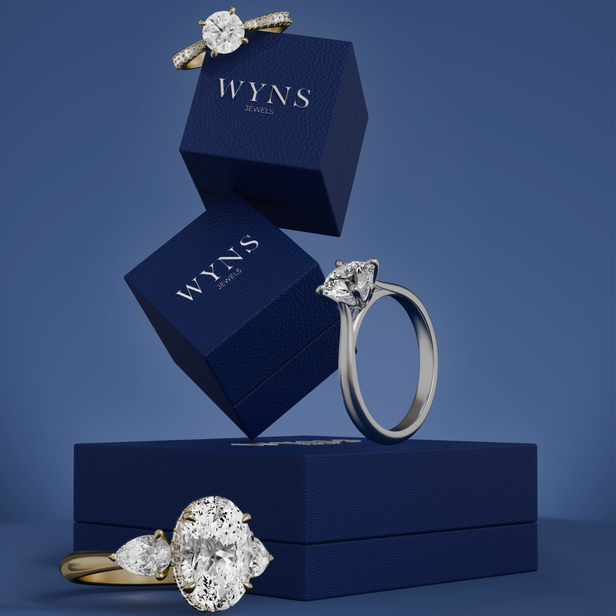A diamond engagement ring and a diamond solitaire ring displayed with blue jewelry boxes labeled WYNS Jewels against a blue background.