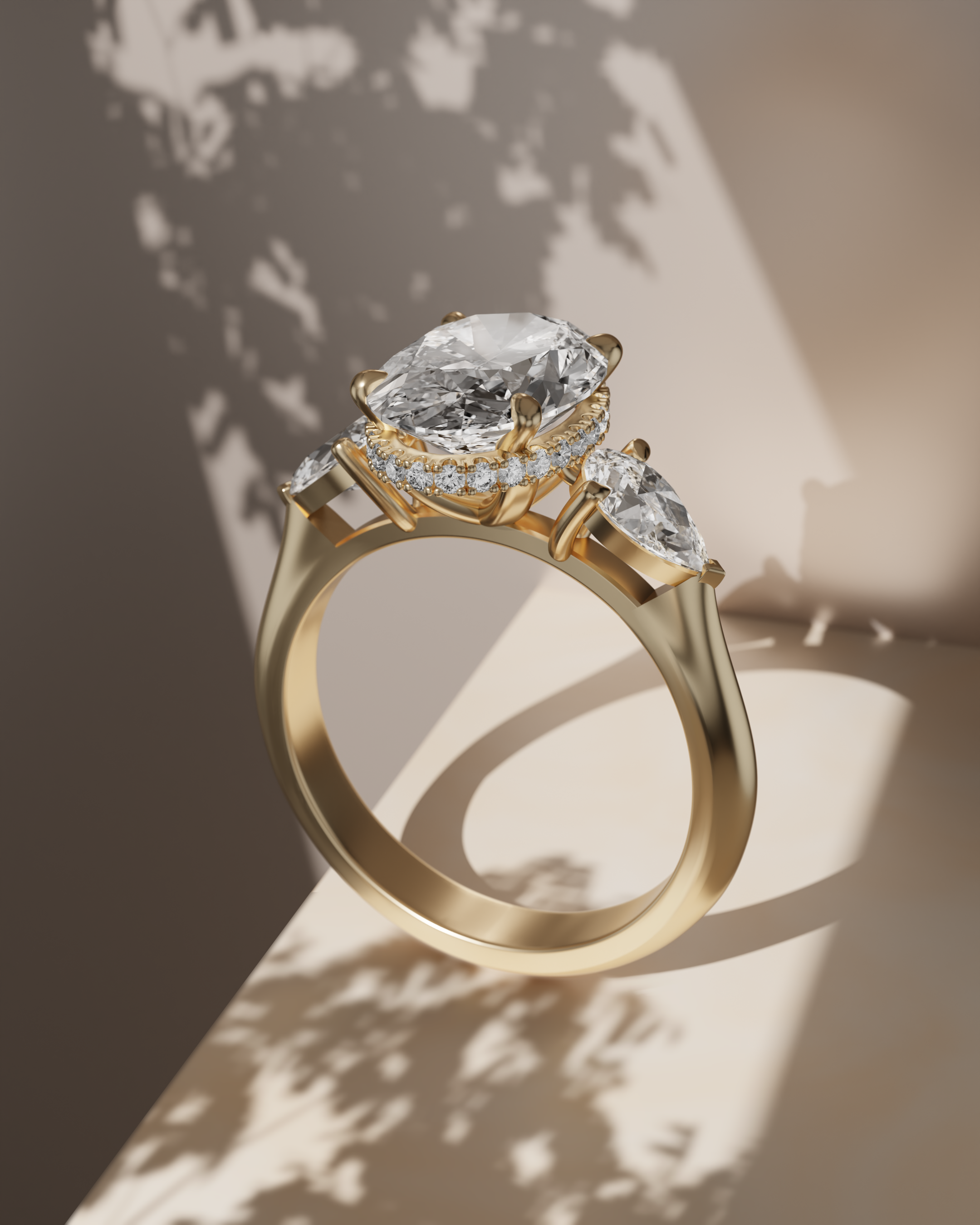 Trilogy hidden halo ring in yellow gold 18K with oval center diamond, accentuated by pear diamonds on the side
