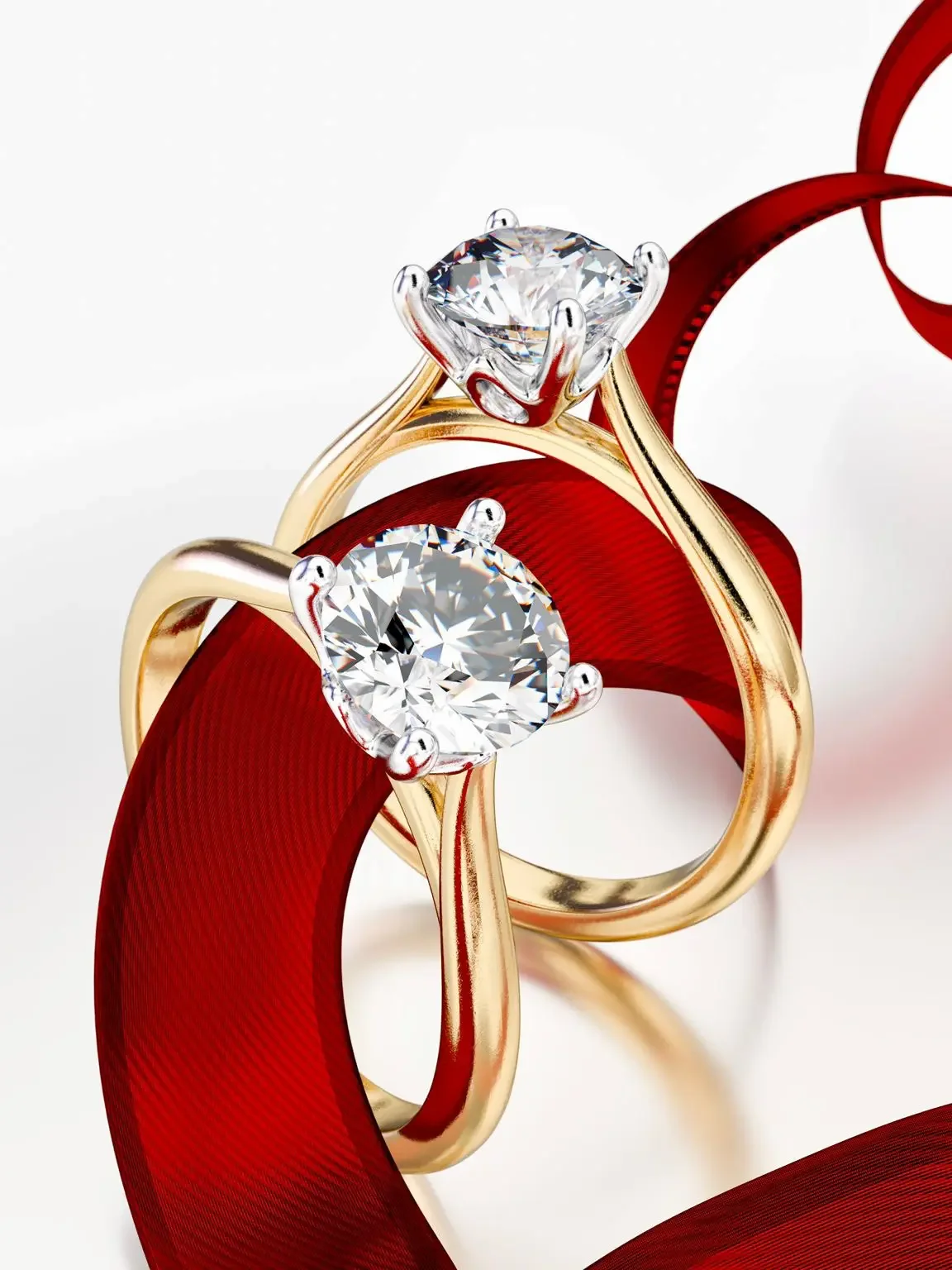 Two round diamond engagement rings 