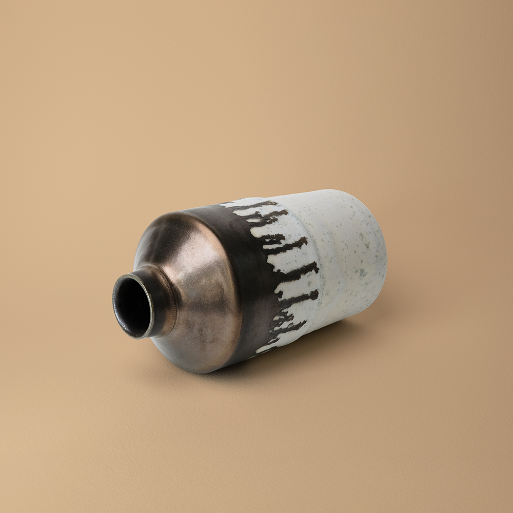 dripping brass bottle