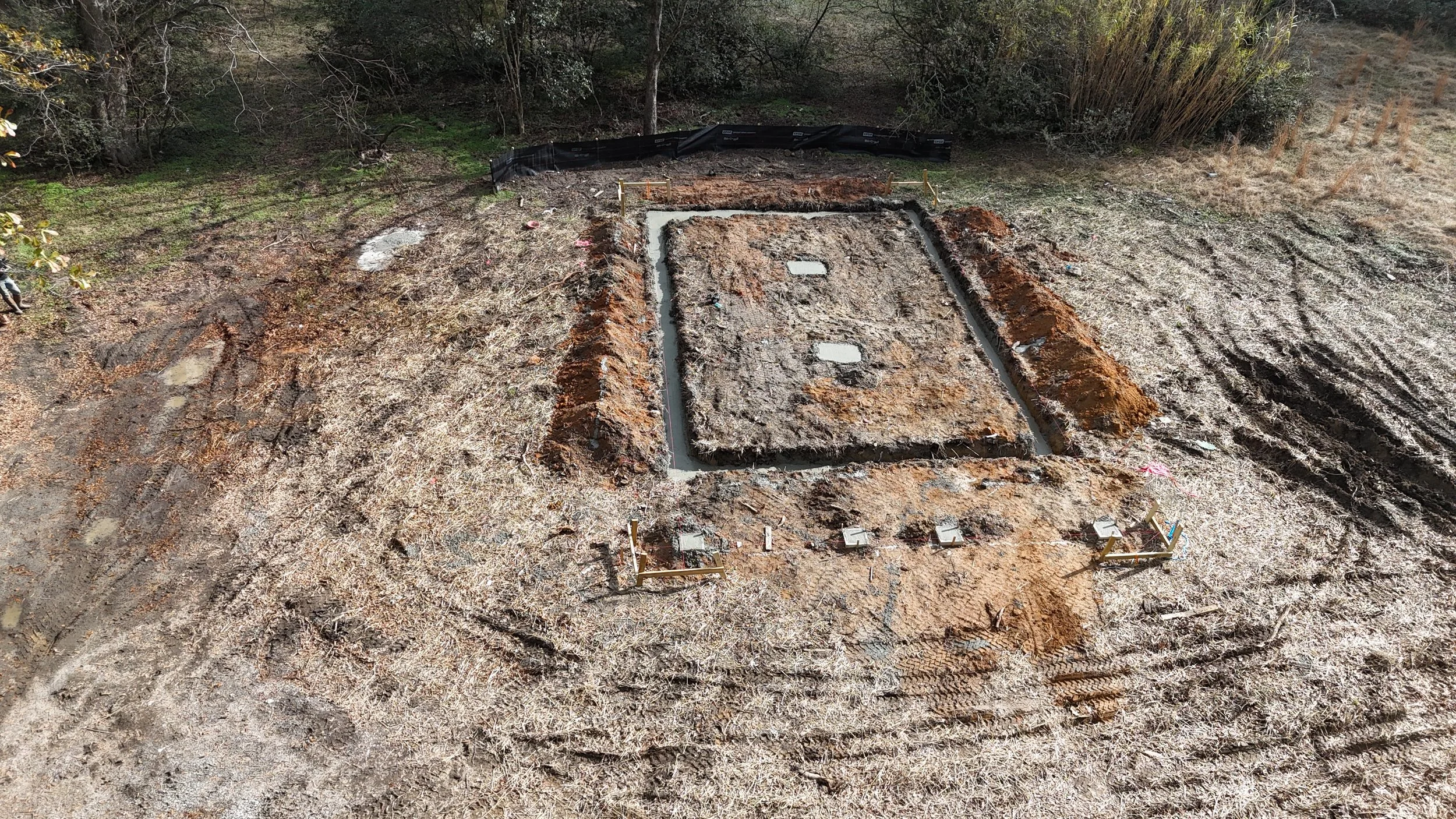 landscaping trenching excavation near me Hartwell georgia debris removal demolition pad site prep footers concrete drainage culverts French drain grading