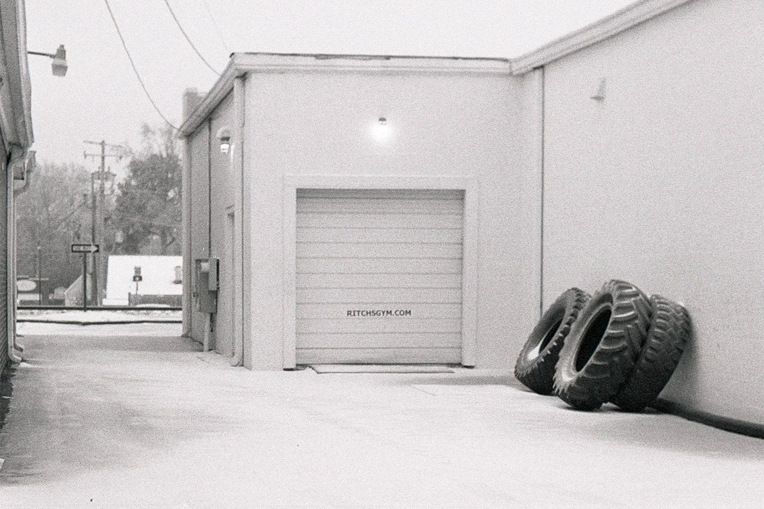 Black and White Film Photograph of Snow Covered Building