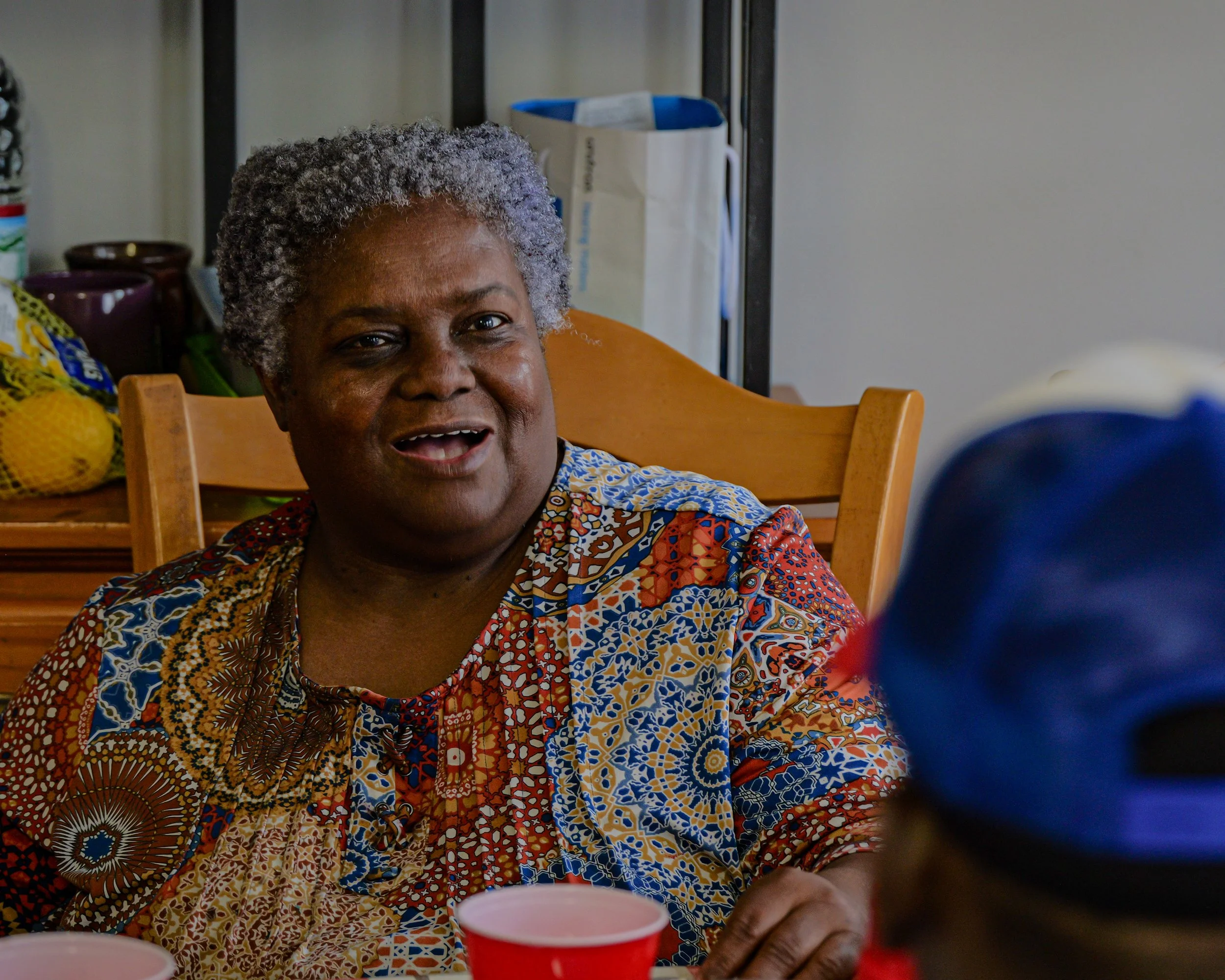 Title: "Our Oracle: Mrs. Margie Robinson” (2025) Medium: Photography  Dimension: 20X16  Photographer: Mario DeBlak Robinson Camera: Panasonic Lumix S5ii