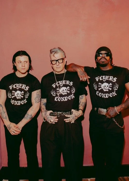 a group of men wearing flyers london t-shirts