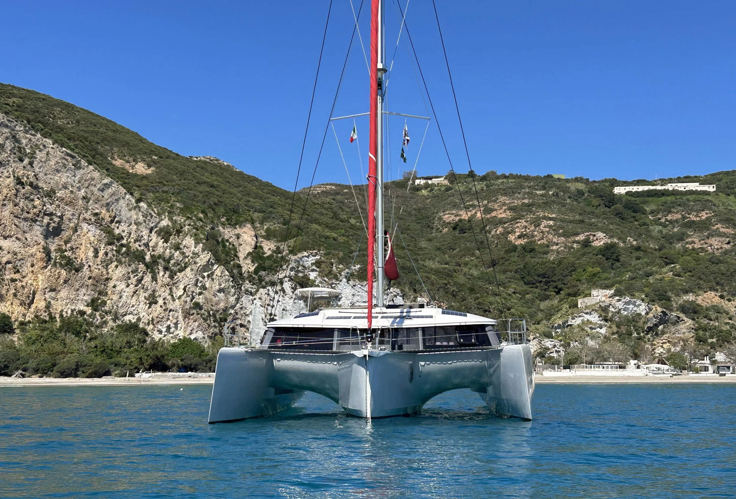 Skylark, a Neel 51 trimran, anchored in Ponza island