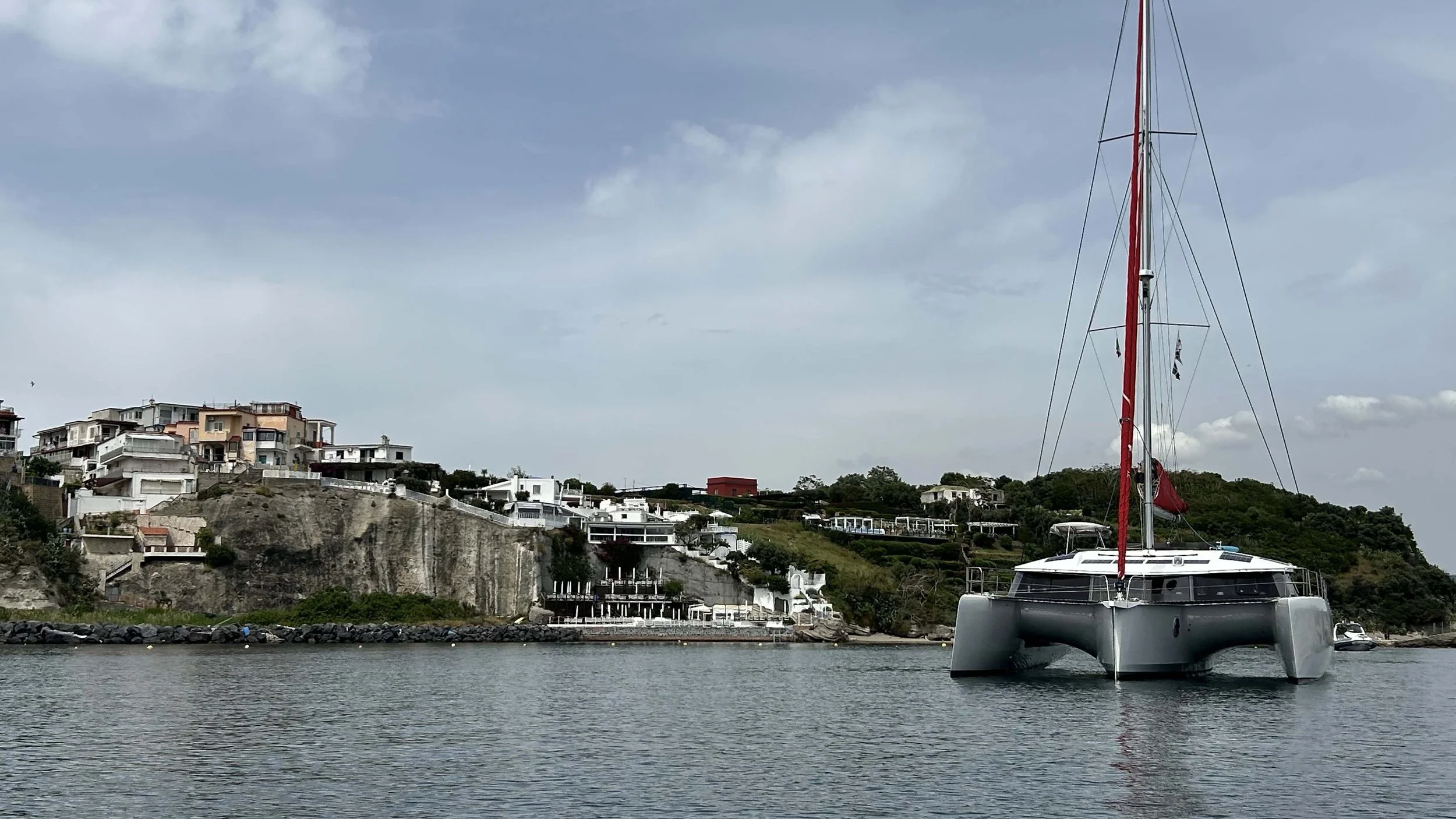 Skylark, a Neel 51 trimaran, anchored in Miseno, Italy