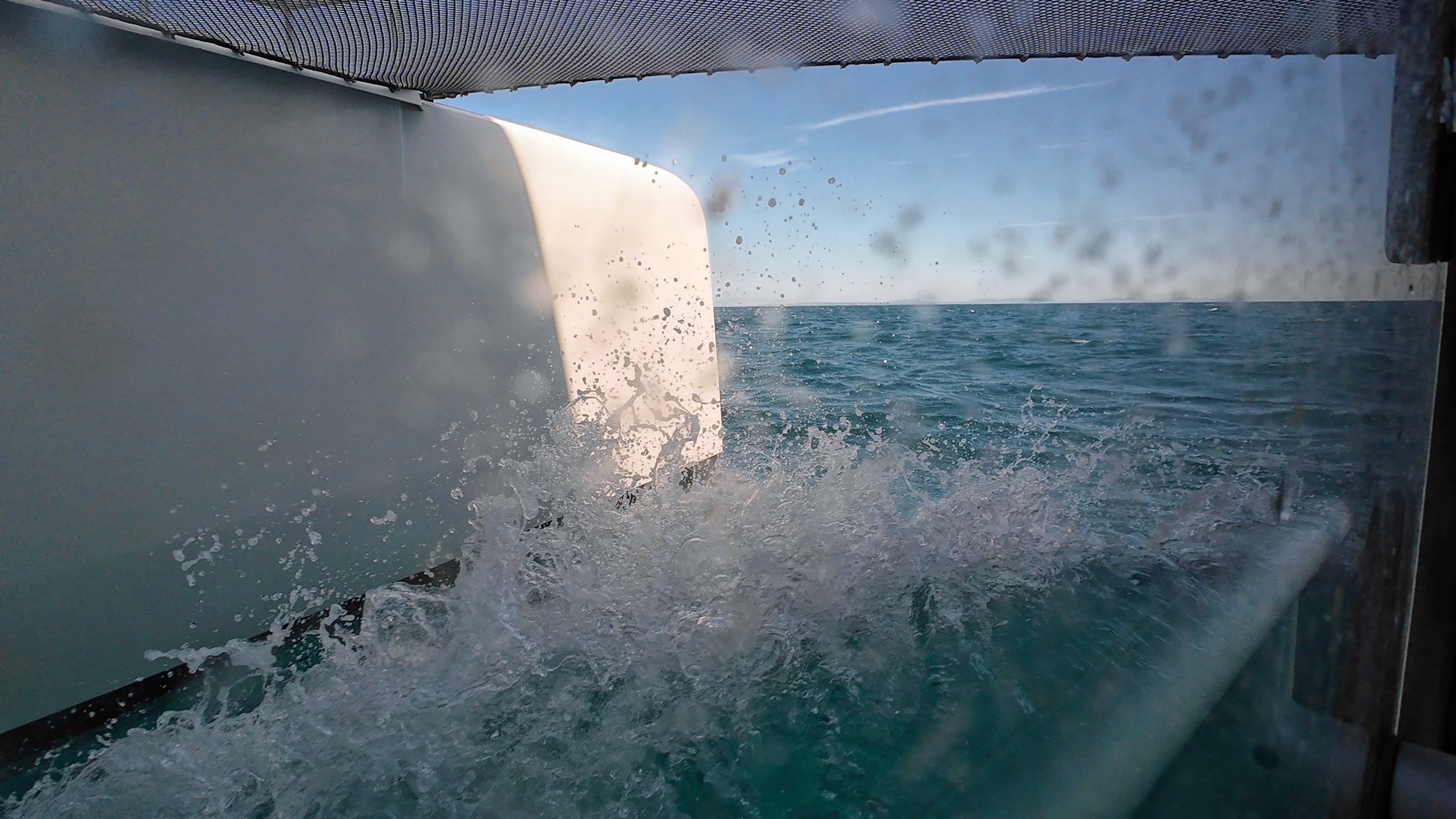 trimaran Neel 51 bow spray trampoline