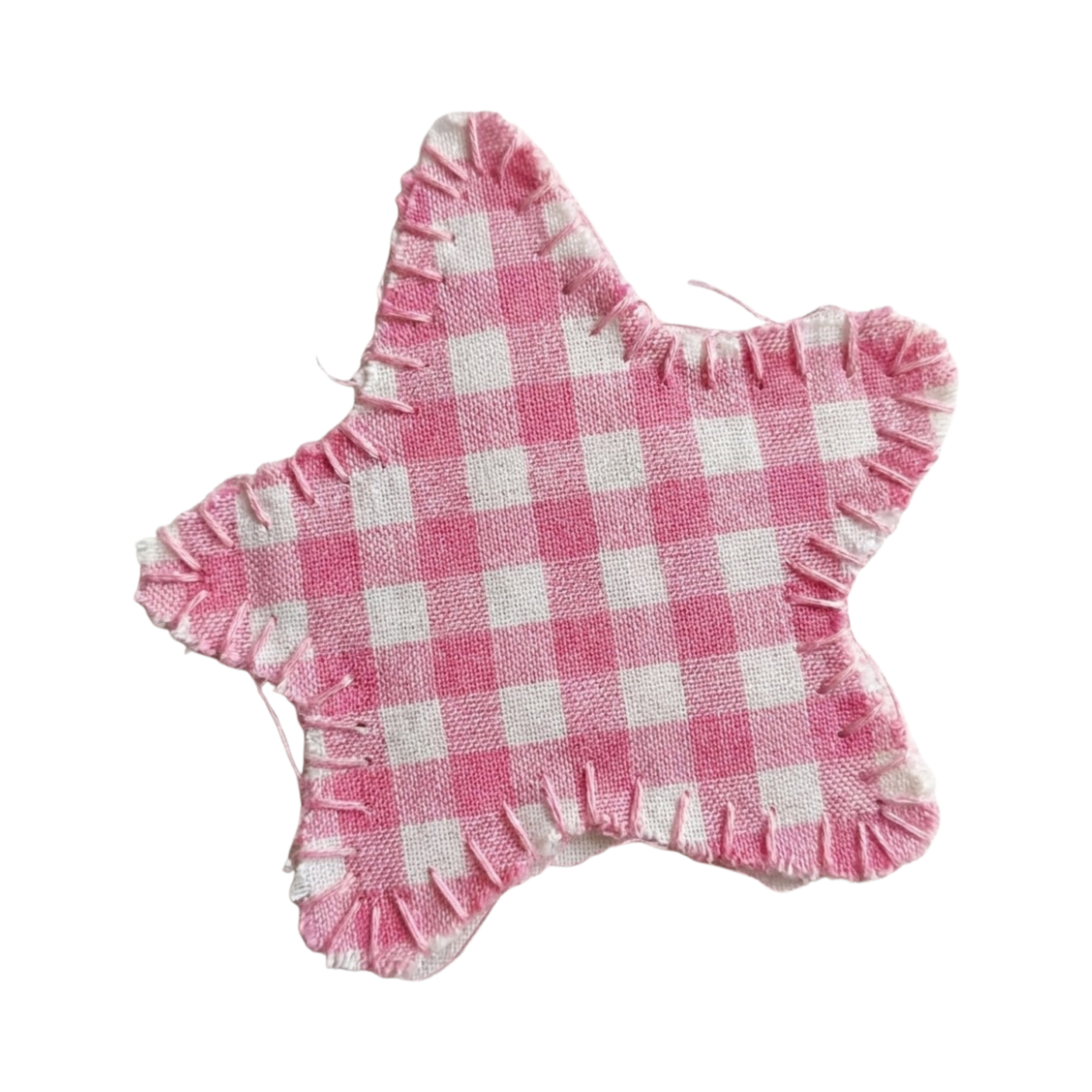Pink and white checkered star-shaped fabric toy with frayed edges.