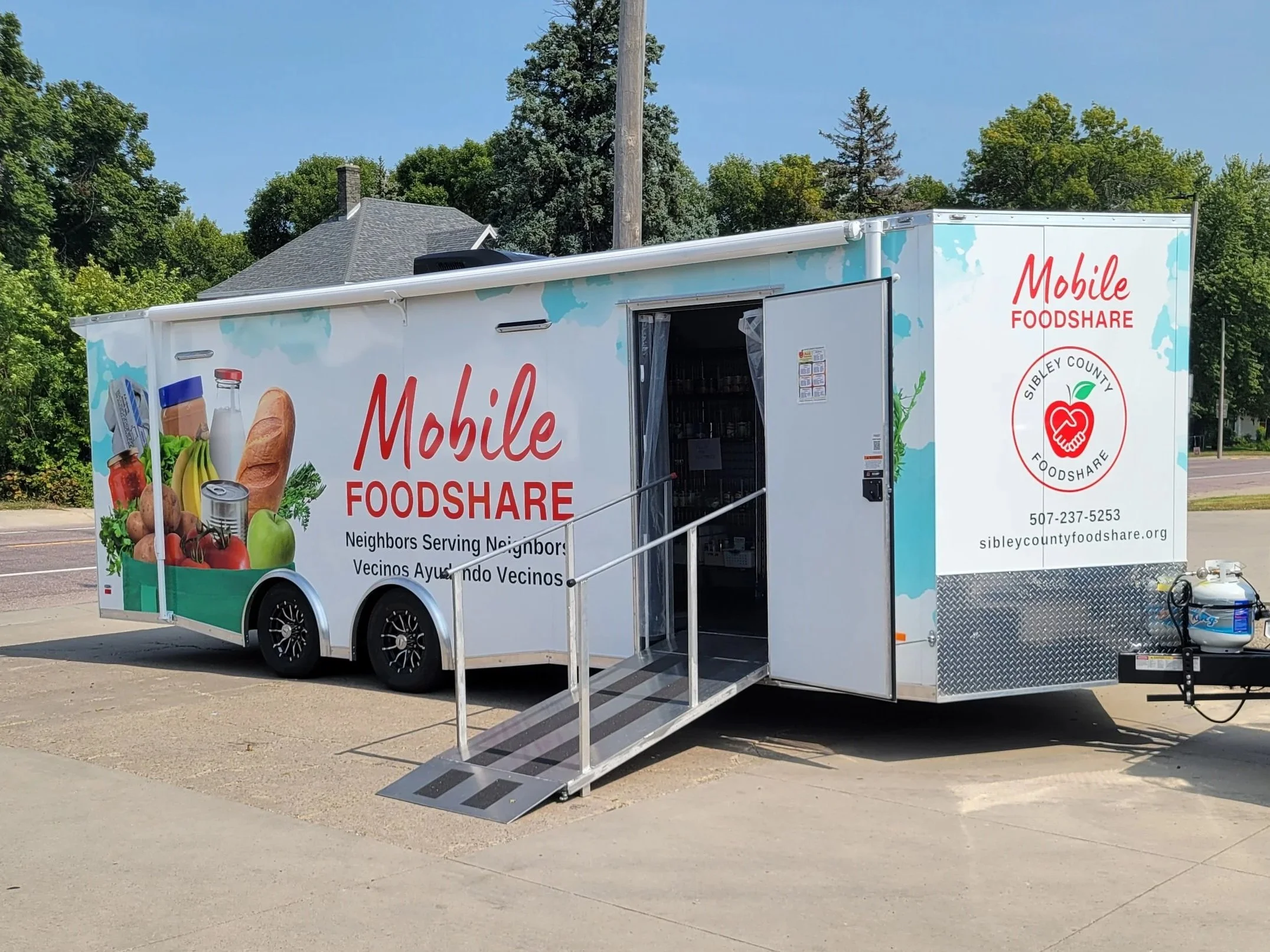 mobile foodshare trailor with ramp and door open