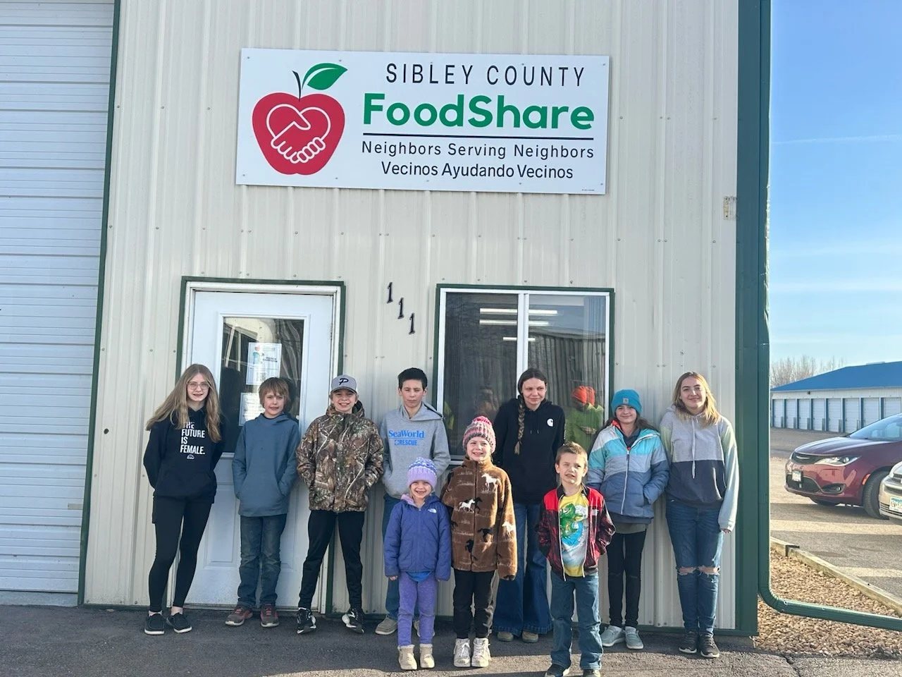 Sibley CountyFoodShare building with people in front