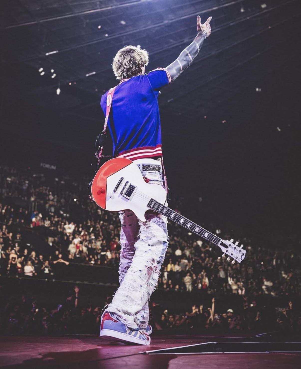 Machine Gun Kelly commemorating his Lost Americana show at the Kia Forum in Los Angeles.