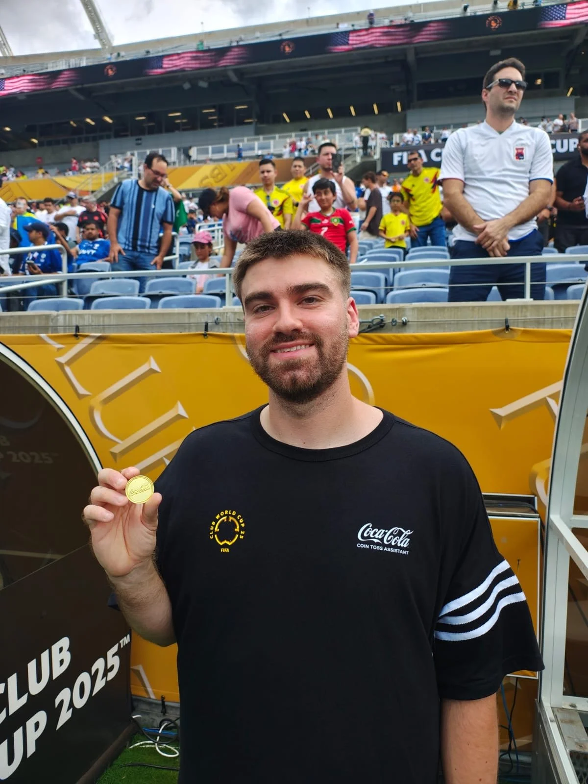 chummys customs holding coin as coca-cola offical coin toss assistant ahead of fifa club world cup quaterfinal