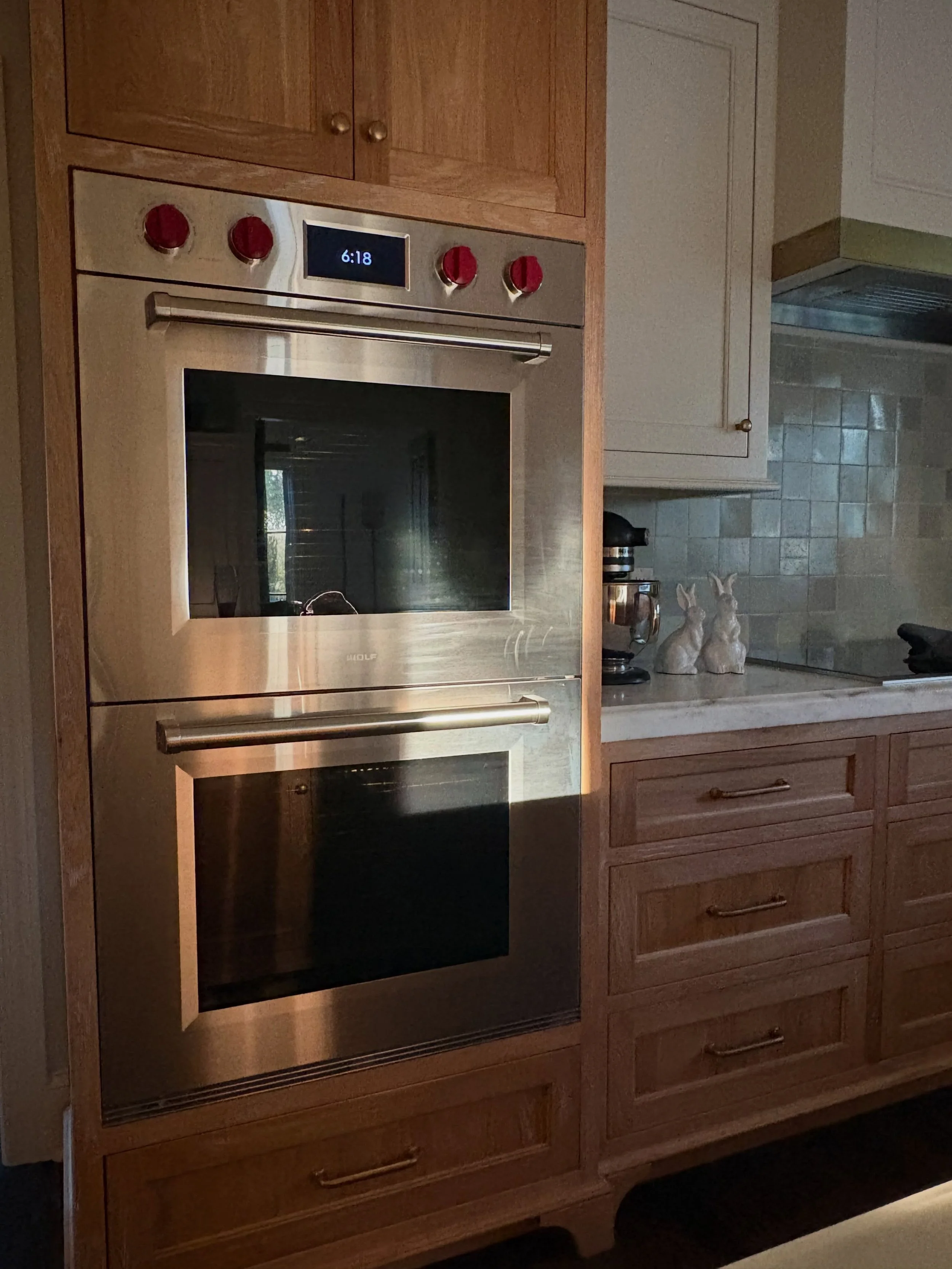 There&rsquo;s something especially beautiful about a kitchen when the evening light begins to glow&mdash;warm wood, aged finishes, and a pair of Wolf double ovens quietly stealing the show.

Because a beautifully designed kitchen should do more than 