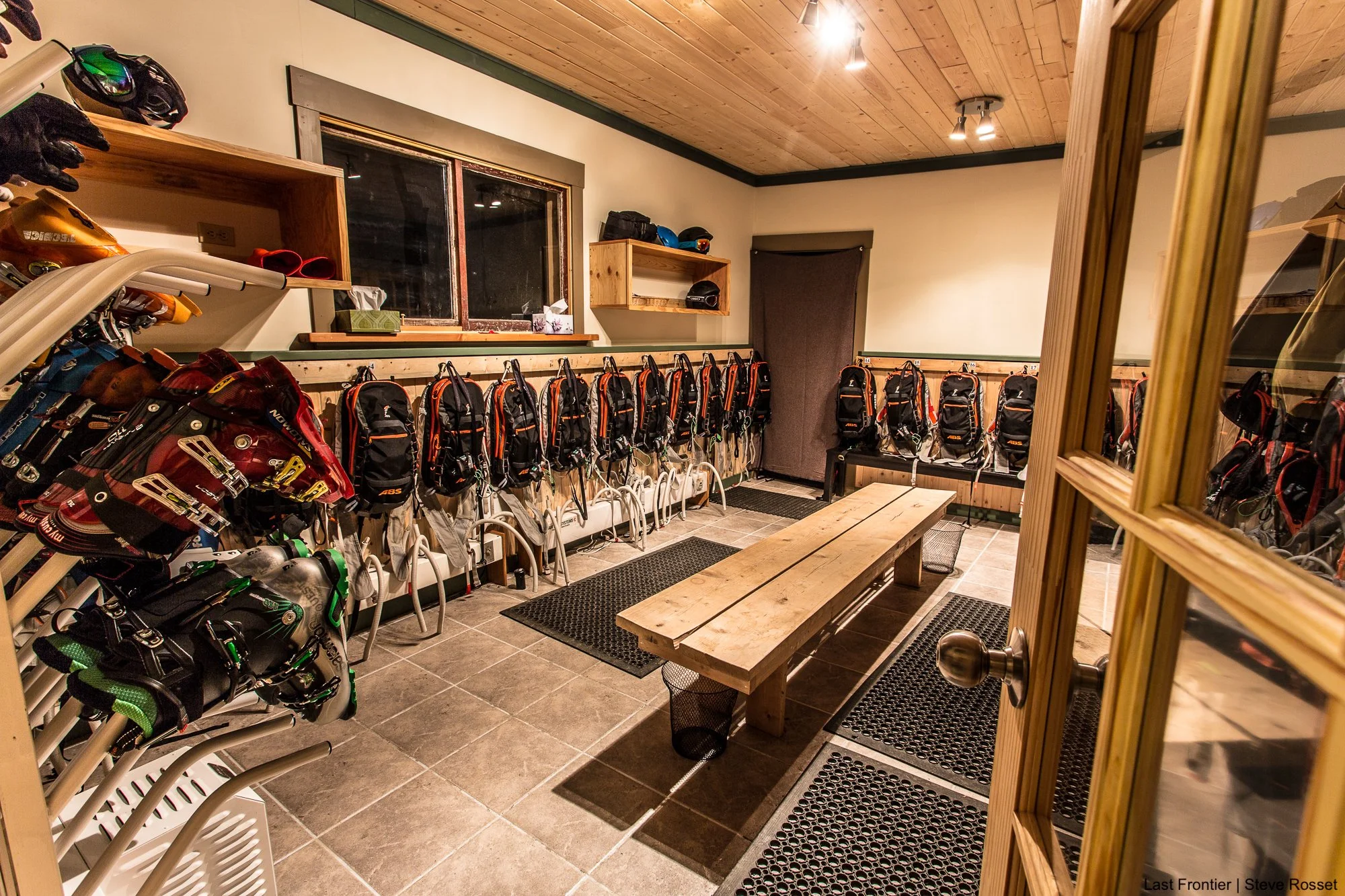 Guests' ski boots and equipment drying after a day of heli skiing at Ripley Creek.
