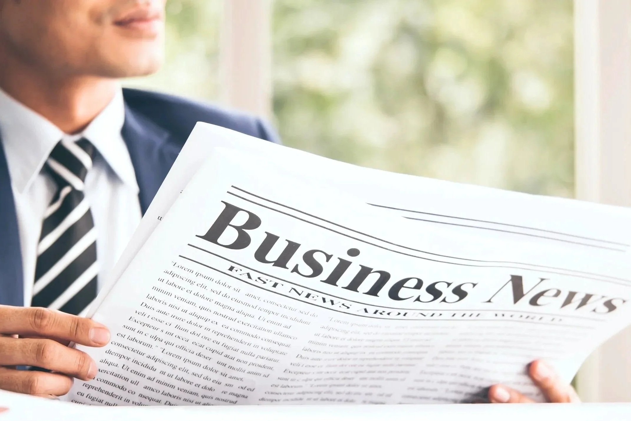 Person in a business suit reading a newspaper titled 'Business News' with the headline 'Fast News'.