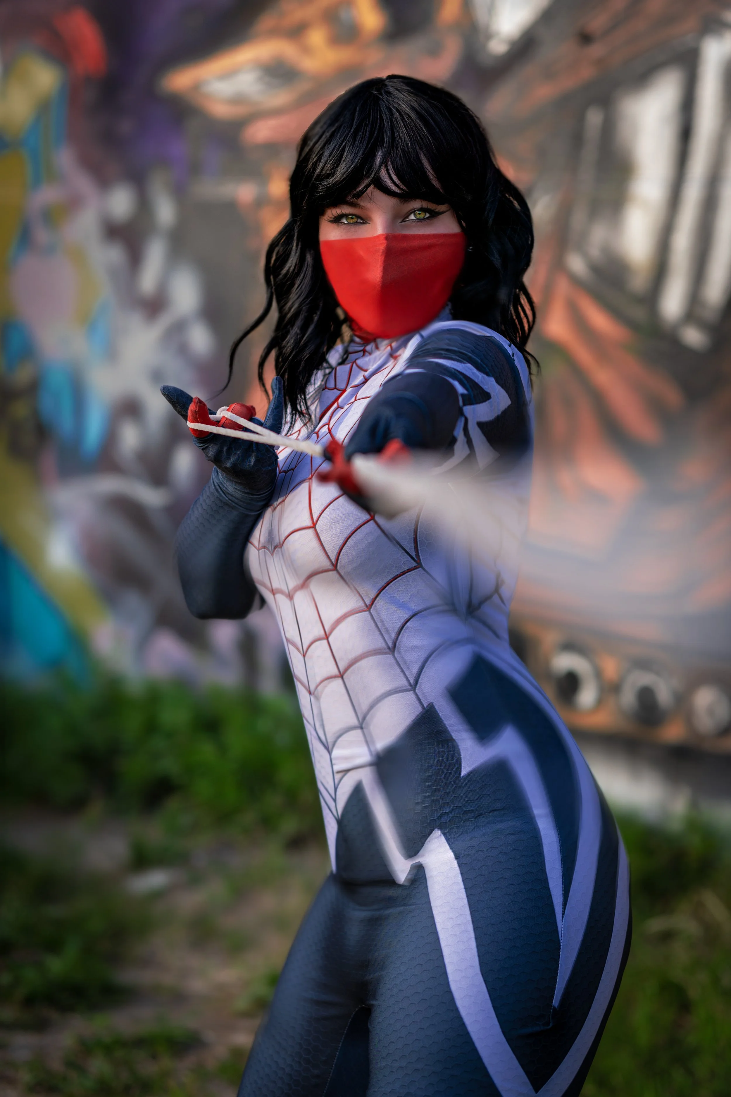Silk (Cindy Moon) owning the frame against Utrecht street art  Powerful Marvel cosplay moment.
Photographer: IgnisInfinity Creative | Cosplayer: RobbinTodd