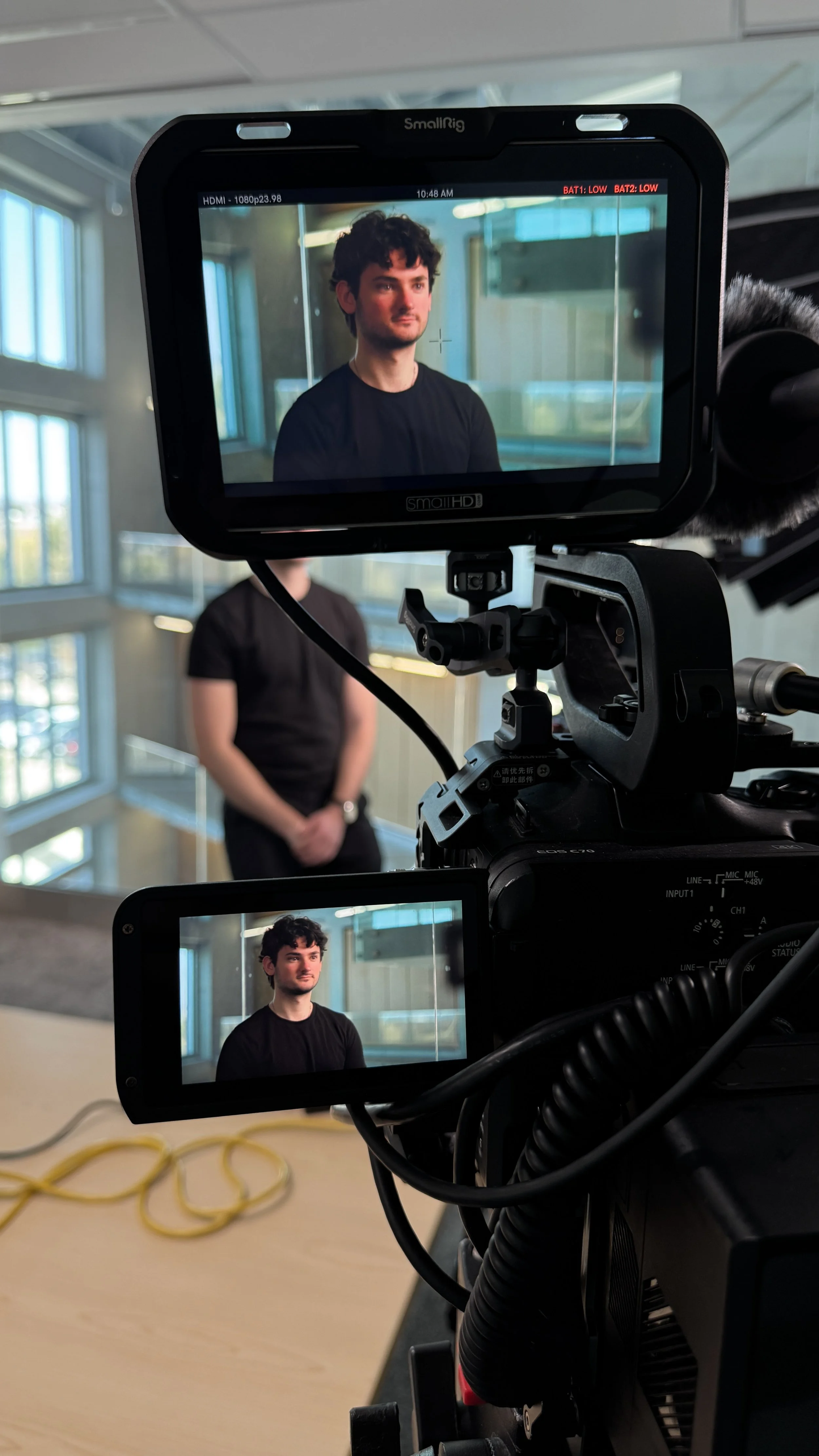 Behind-the-scenes at a Deadline Creative photography session featuring professional portrait photography, brand imagery, and commercial photography created for businesses across Burlington, Hamilton, Oakville, and the GTA.
