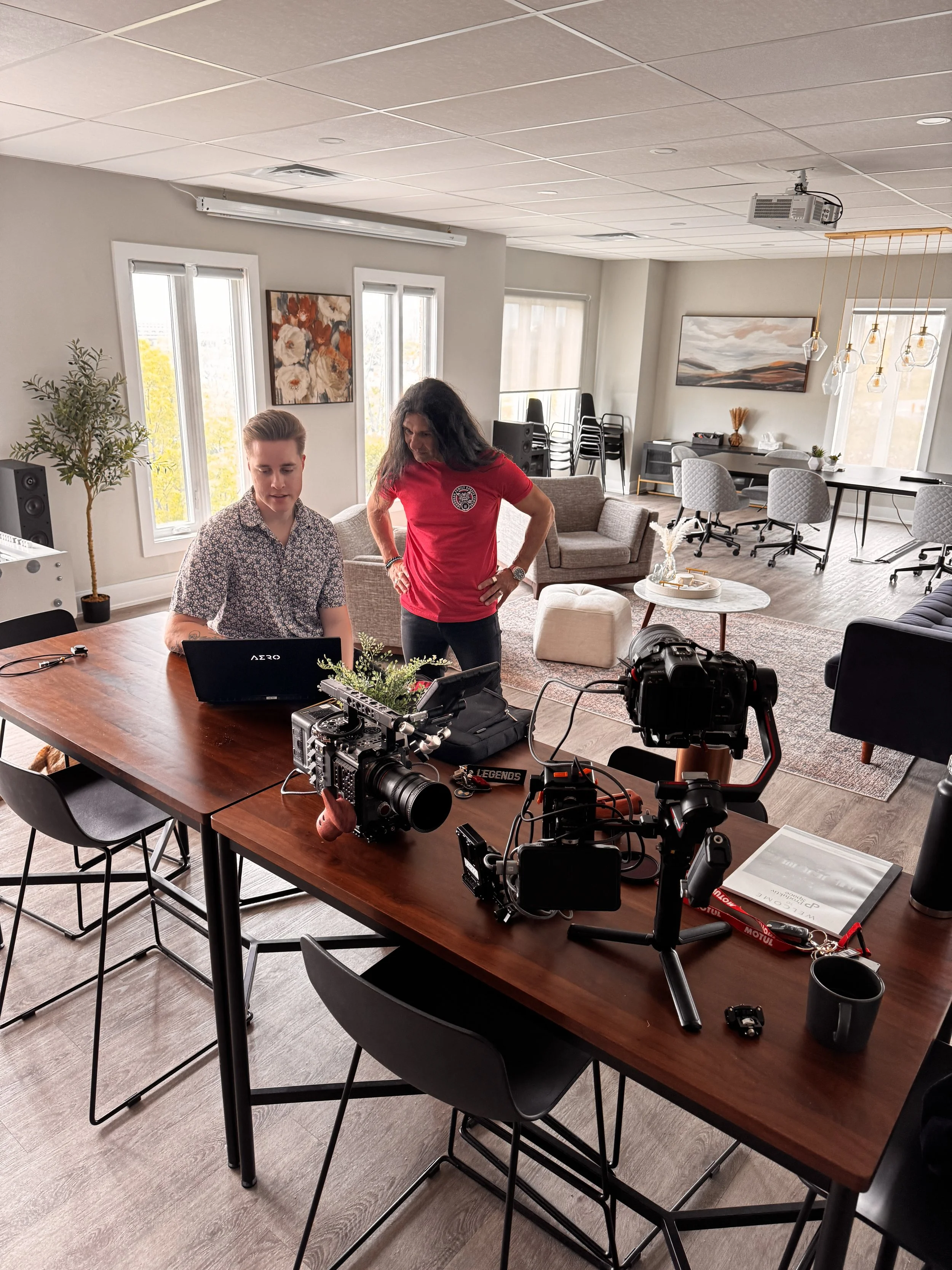 Professional photography planning session at Deadline Creative featuring creative direction, camera equipment, and brand imagery development for commercial photography projects in Burlington, Hamilton, Oakville, and the GTA.