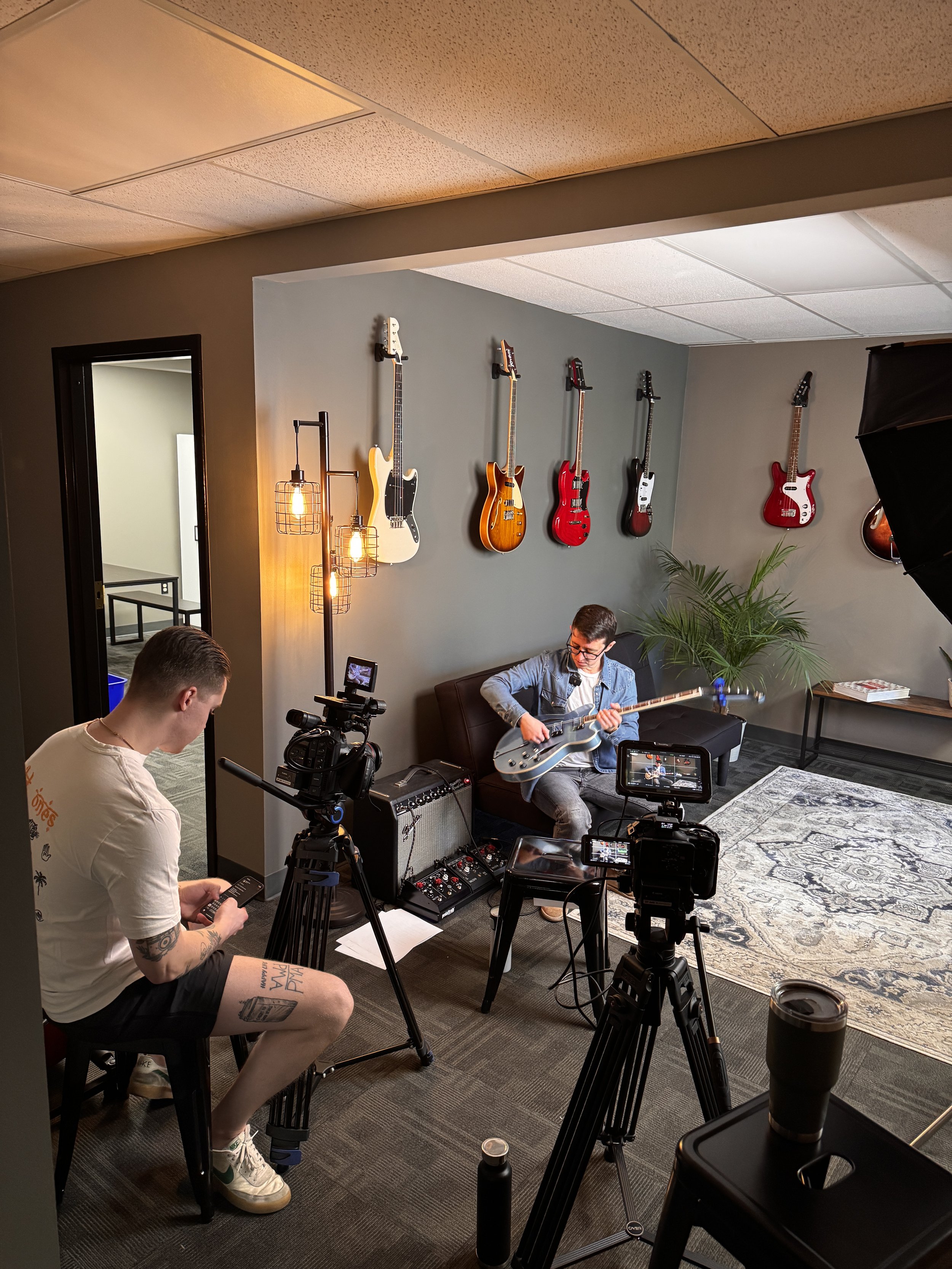Brand strategy behind-the-scenes at a Deadline Creative brand strategy and video production shoot, featuring professional filming equipment, creative storytelling, and branded content creation in a modern studio setBrand 
