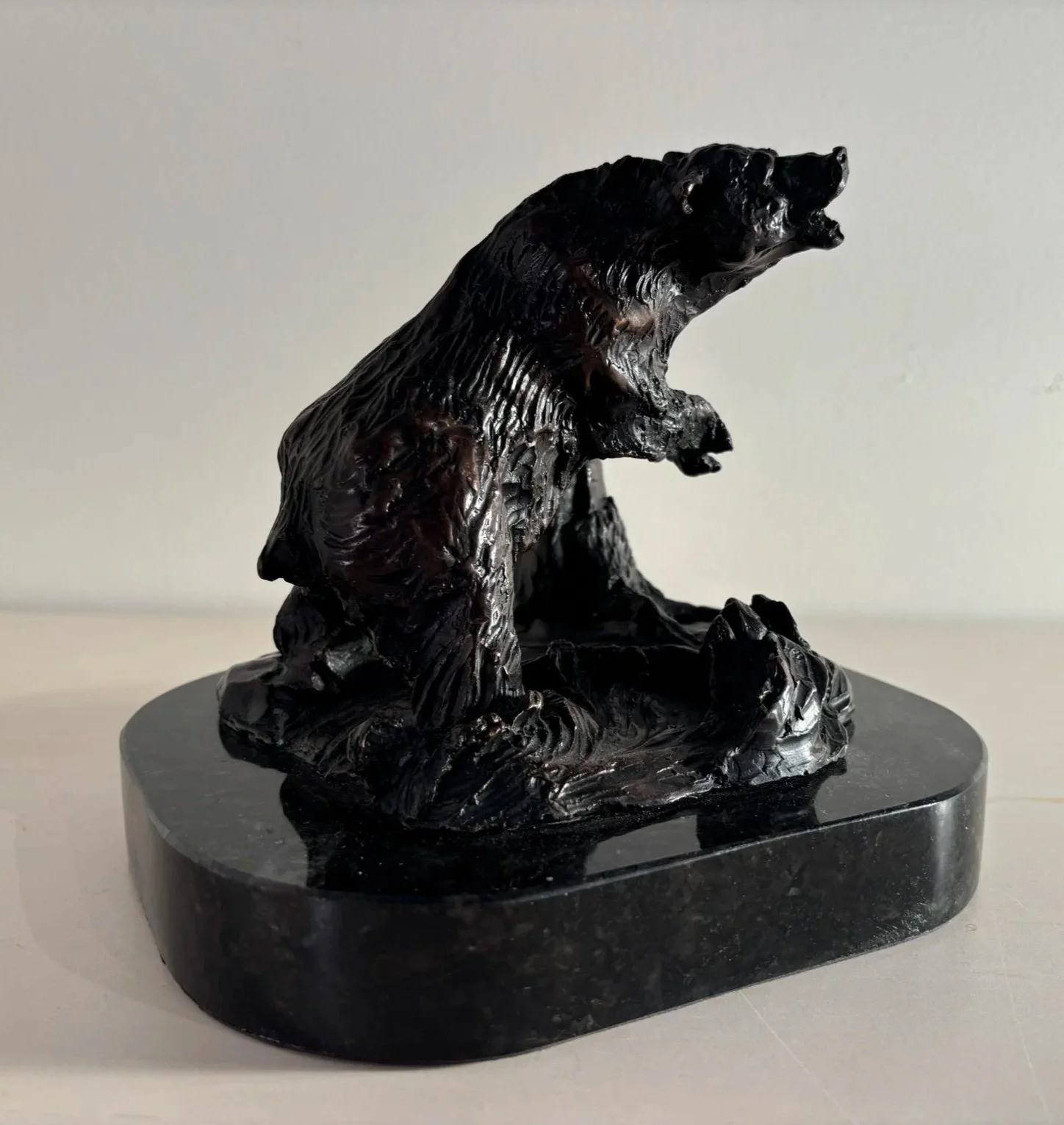  Stirring the Water, Bronze, 7 x 6 x 6 inches 
 One of three sculptures commissioned for the 2003 Winter Olympics symbolizing "stronger" of the "higher, faster, stronger" Olympic motto. 

