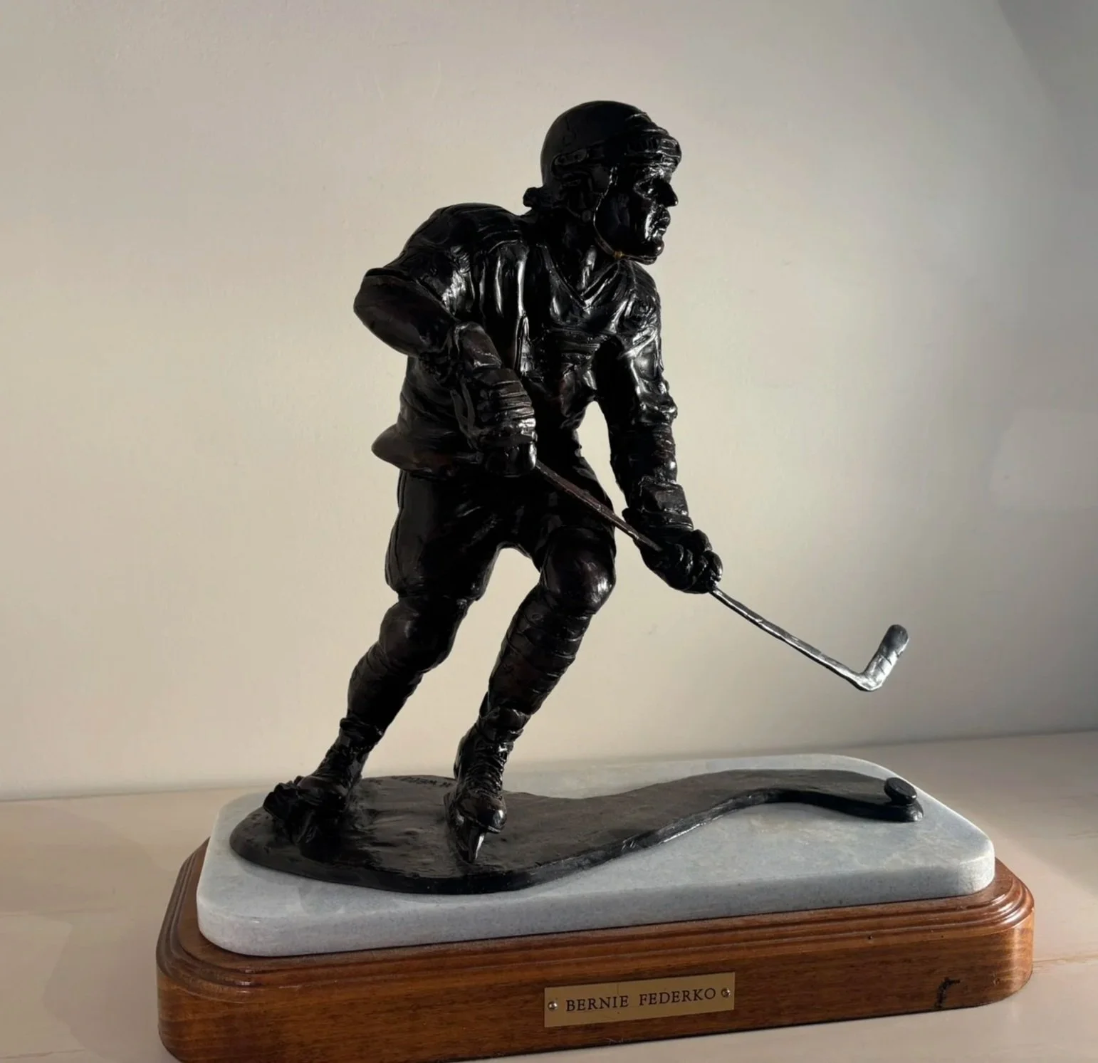  Bernie Federko, Bronze, 17.5 x 15 x 9 inches  
 This maquette served as the model for the larger-than-life sized statue of the St. Louis Blues player installed in 2023 outside of the Scottrade Center. 