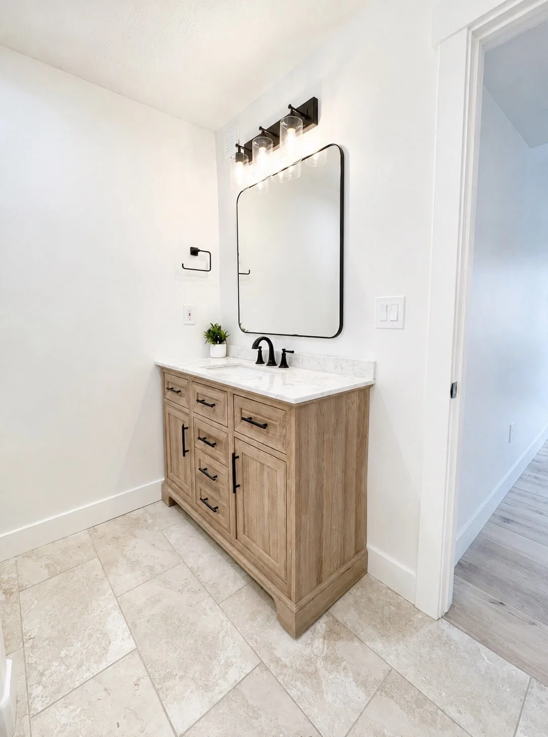 Bathroom vanity and floor - Haus Interiors.JPG