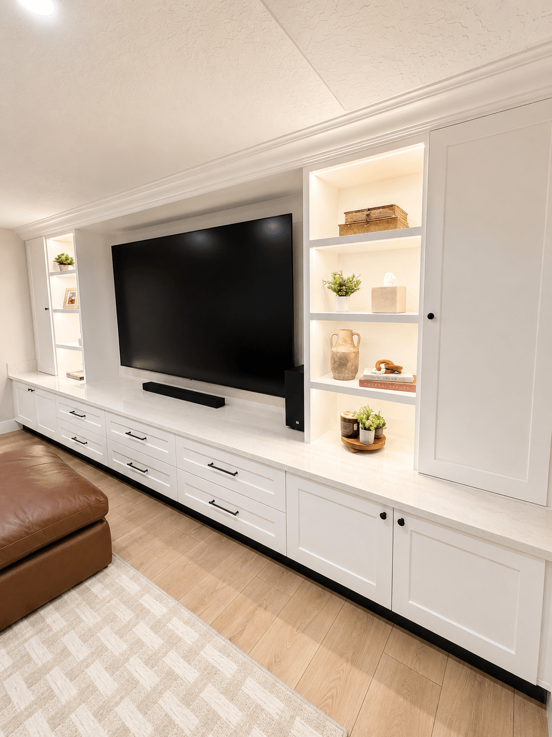 Custom shelves and tv - Haus Interiors.PNG