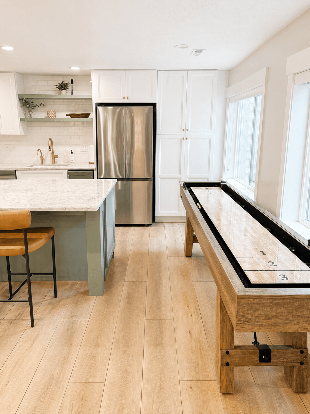 Basement living room and kitchen - Haus Interiors.PNG