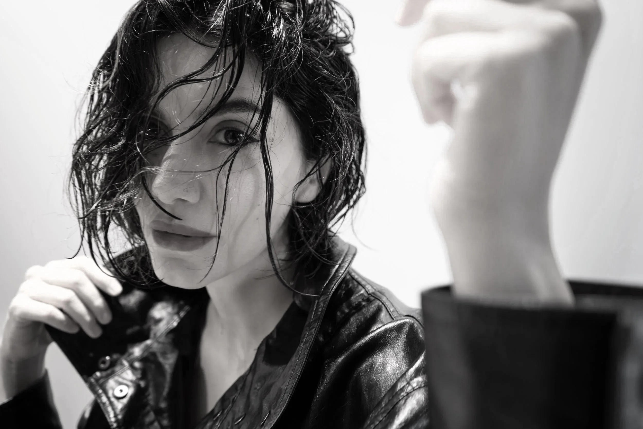 Black and white self-portrait of a woman