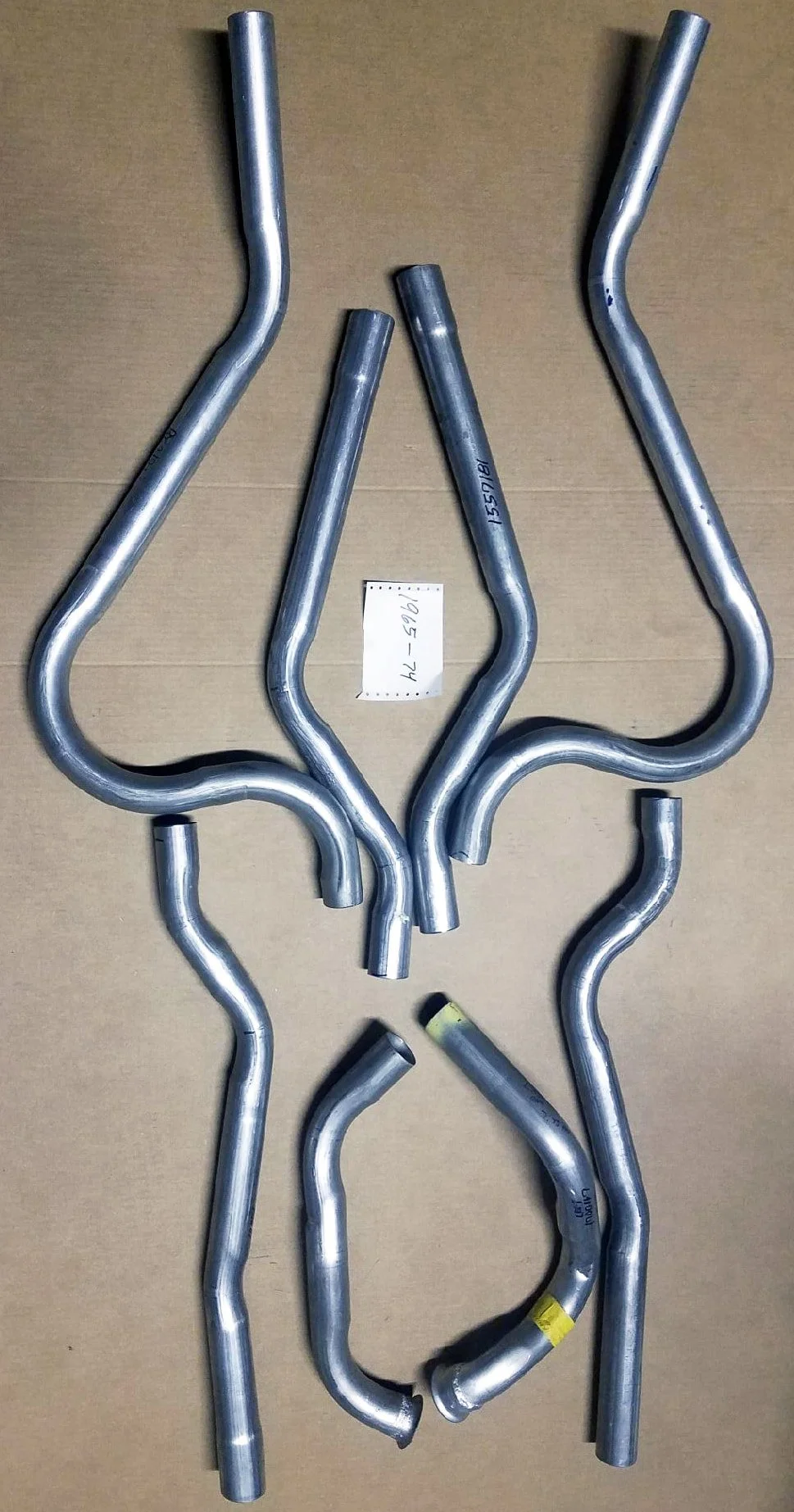 8-piece 409 stainless steel exhaust pipe kit for 1966-1974 Avanti II, jig-fitted to original blueprints by Nostalgic Motor Cars.