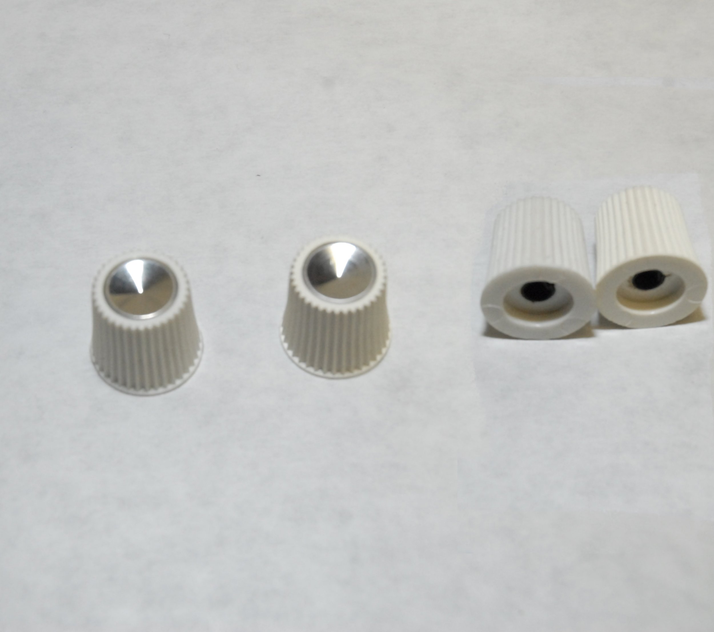 NOS white radio knobs pair for 1963-1975 Studebaker Avanti, Part 1561562, 36 serrations