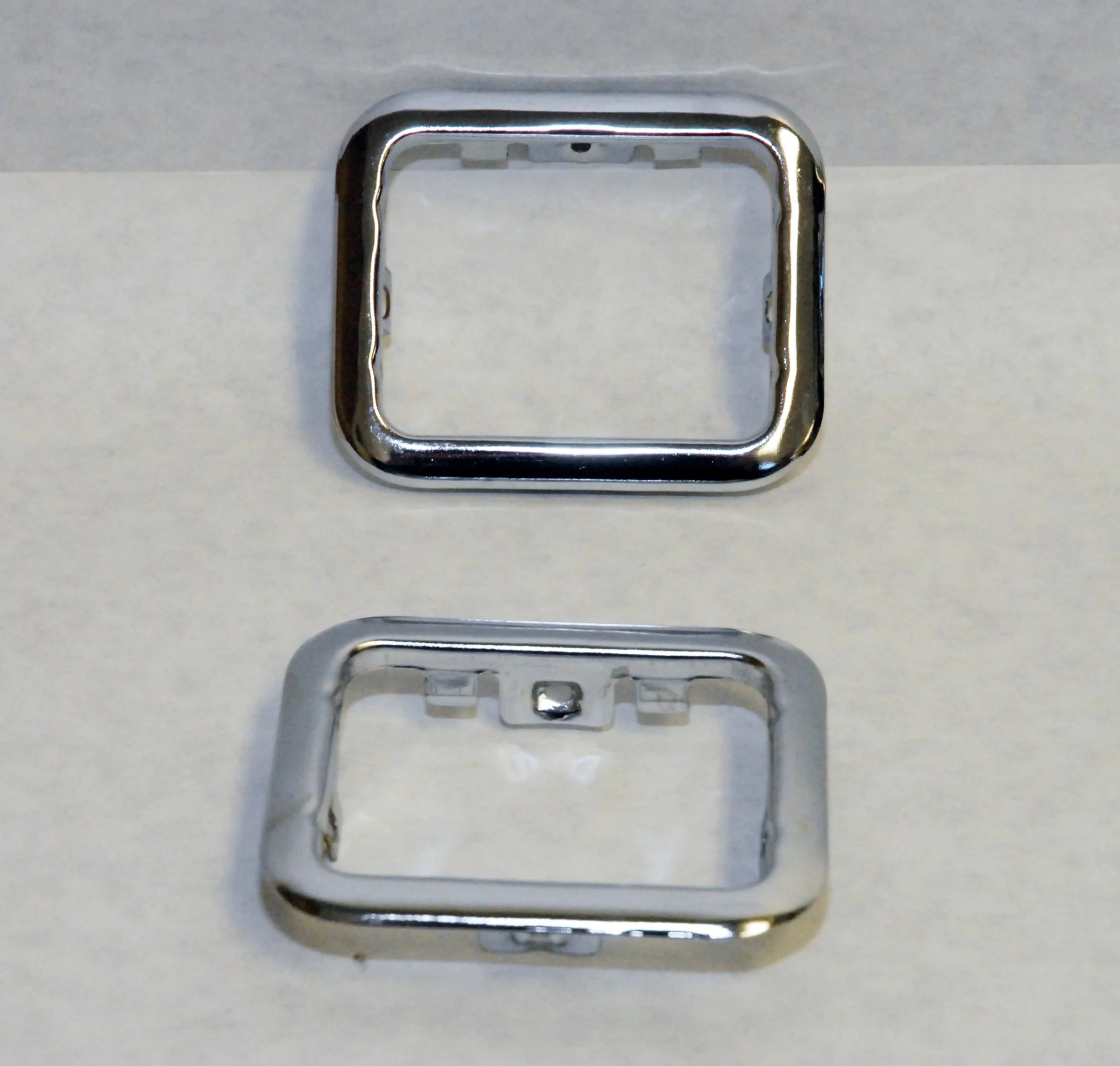 NOS Chrome Rear Armrest Ash Tray Retainer Bezels for 1963-1974 Studebaker Avanti, Part 1347718.