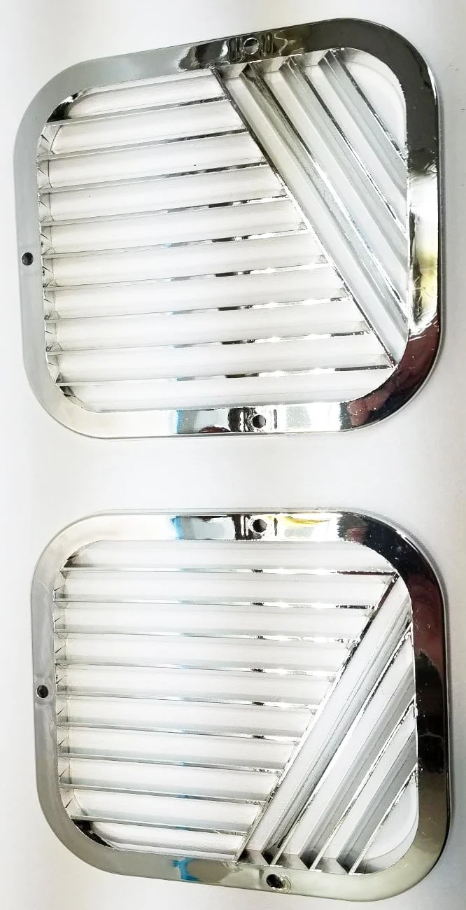NOS Gloss Chrome Interior Fresh Air Outlet Grills for 1963-1985 Studebaker Avanti, Parts 1358874c and 1358875c.