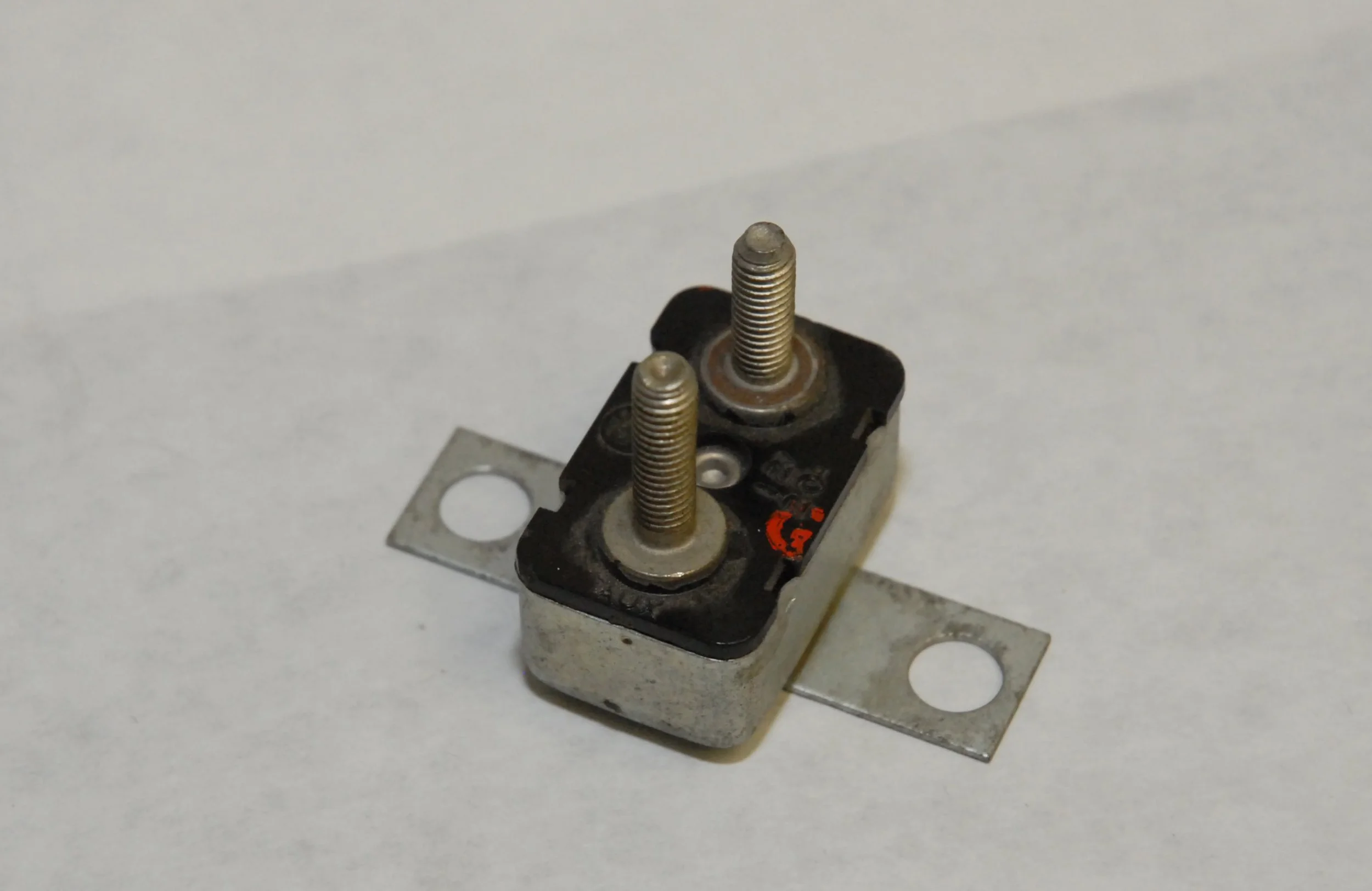 N.O.S. 20 Amp Power Window Circuit Breaker with mounting bracket for Studebaker Avanti, Part 1314144