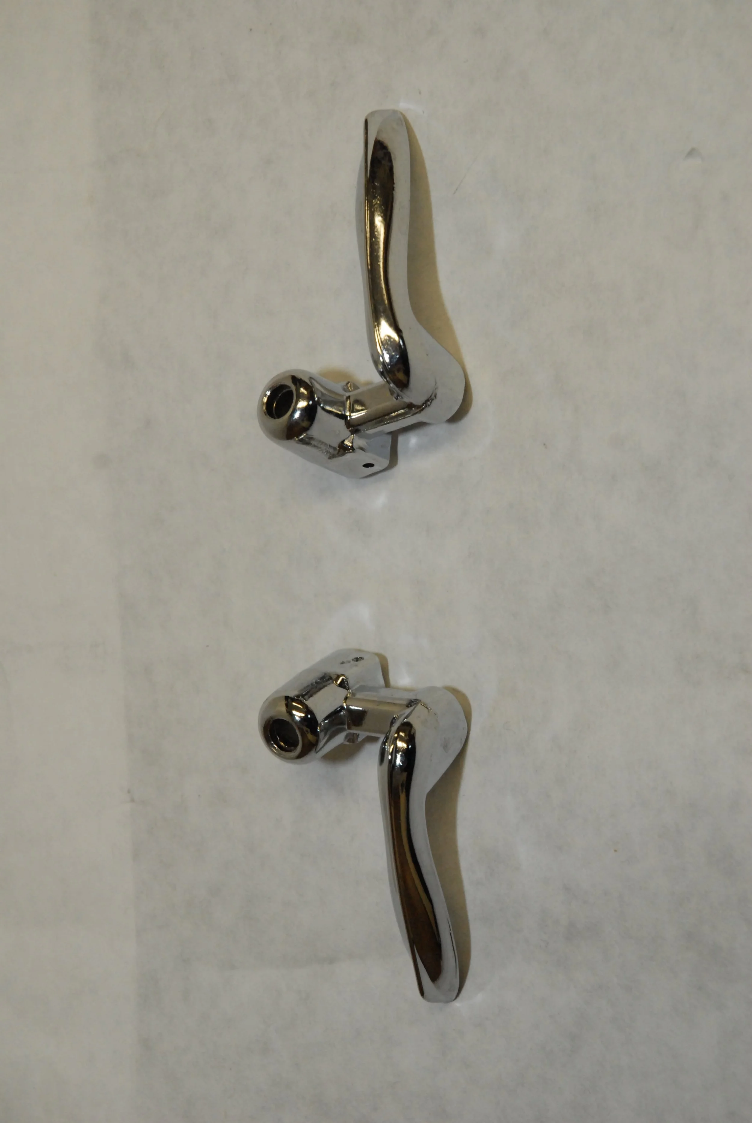NOS Chrome Interior Vent Window Handles Pair for 1963-1985 Studebaker Avanti, Parts 1328478 and 1328479.