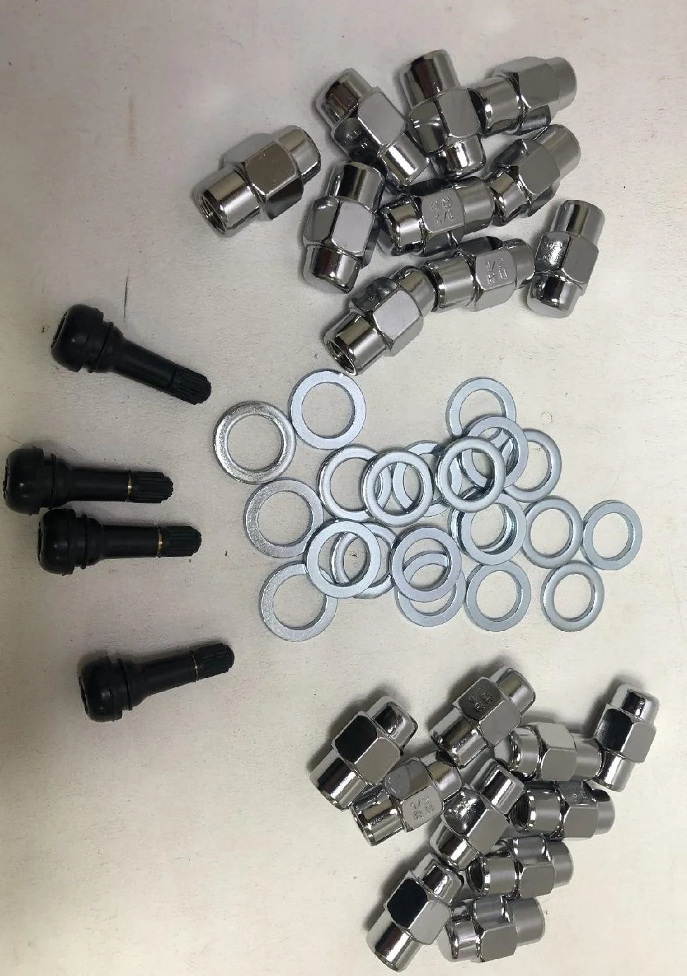 20-piece chrome lug nut, washer, and valve stem hardware kit for Studebaker Avanti aluminum wheels.