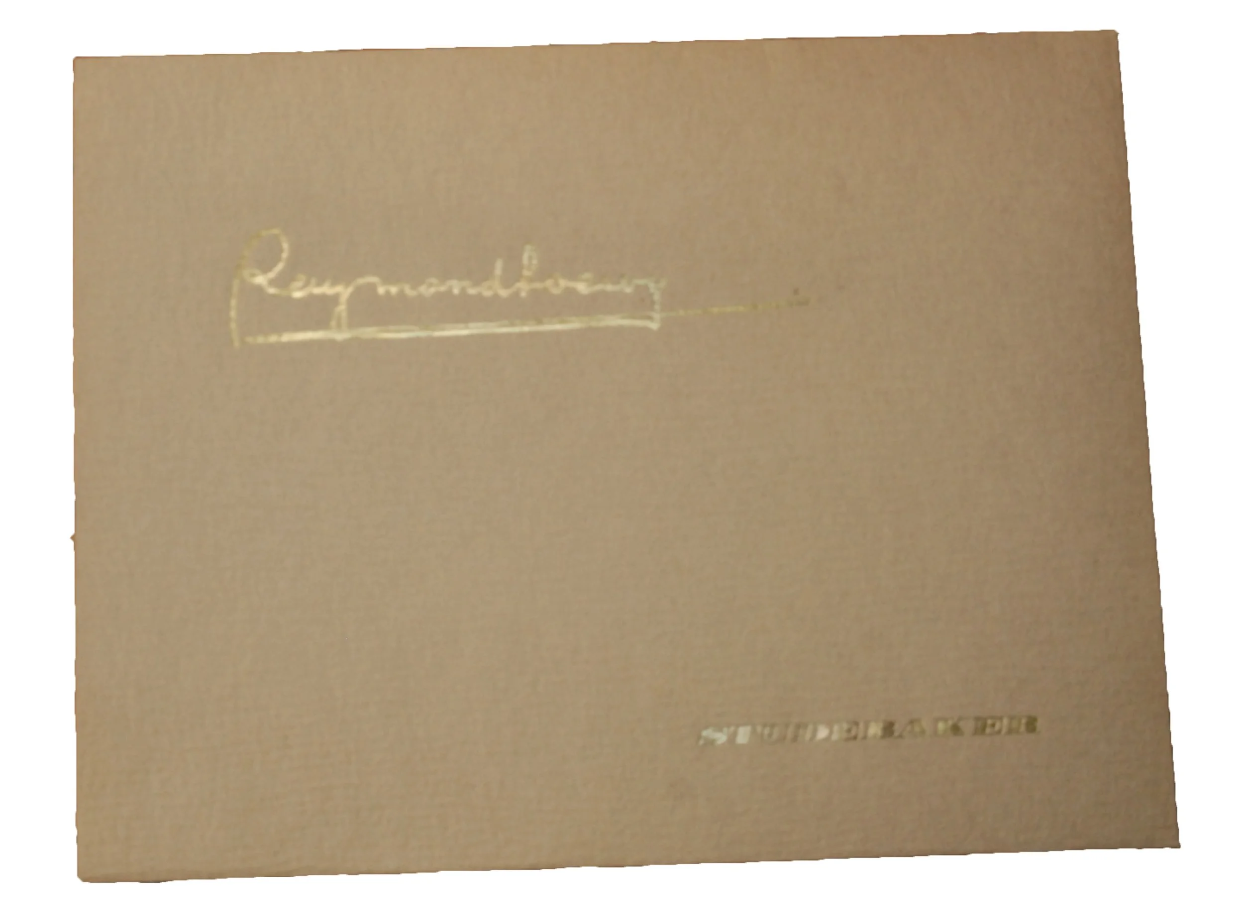 Gold foiled Raymond Loewy signature and Studebaker logo on large folio envelope.