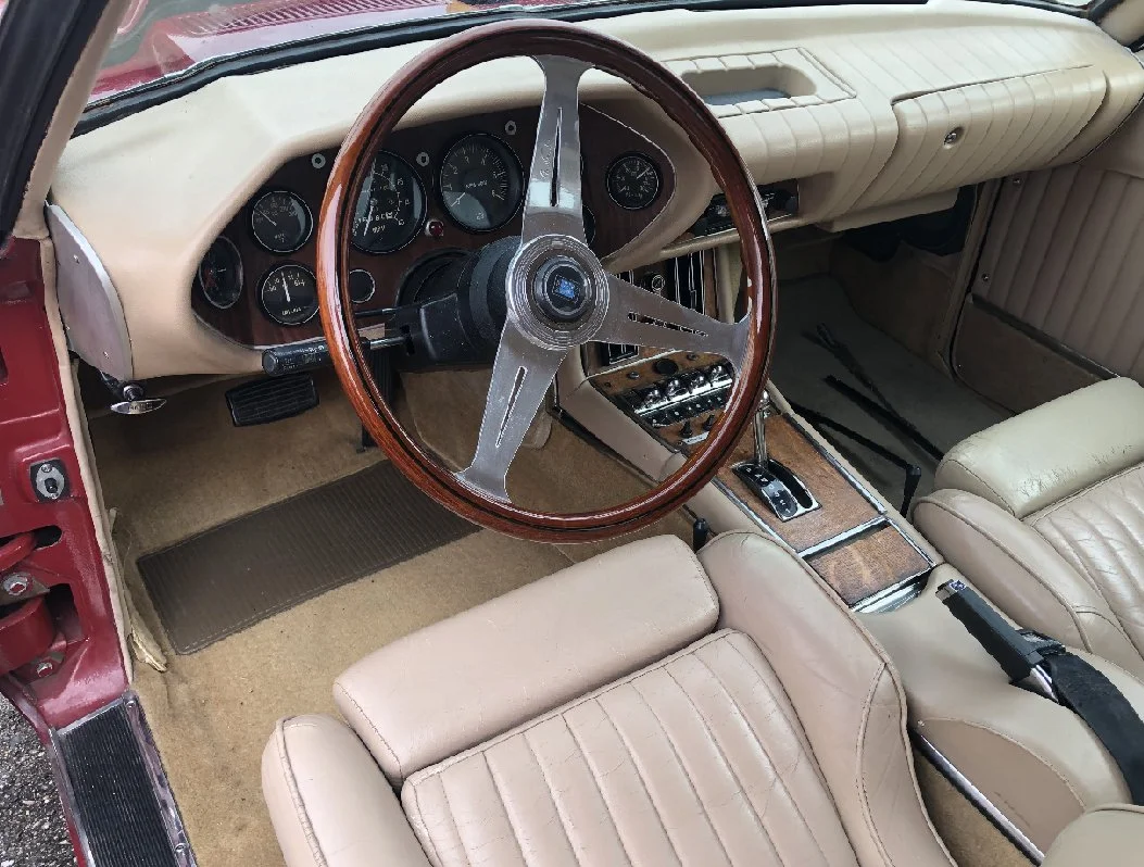 Nardi steering wheel and dash layout inside a 1983 Avanti II.