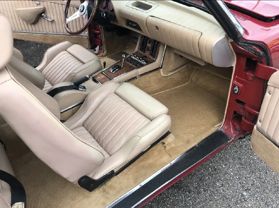 Avanti Bisque Leather interior featuring original Recaro front bucket seats.