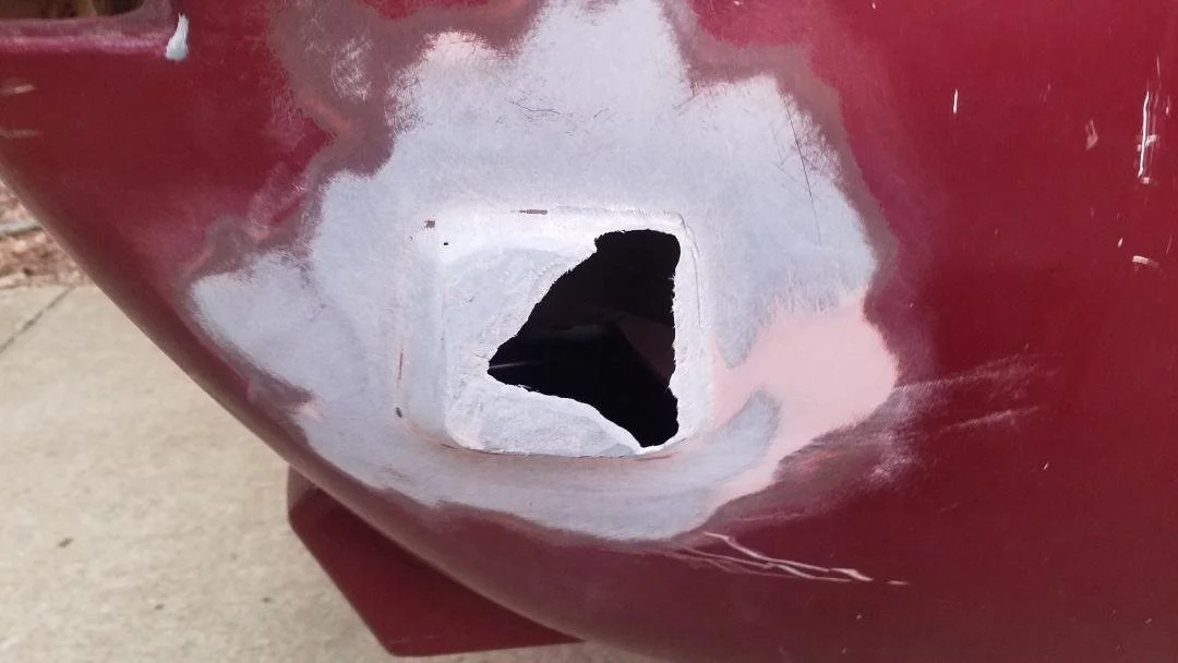view of 1968 Avanti body showing damage