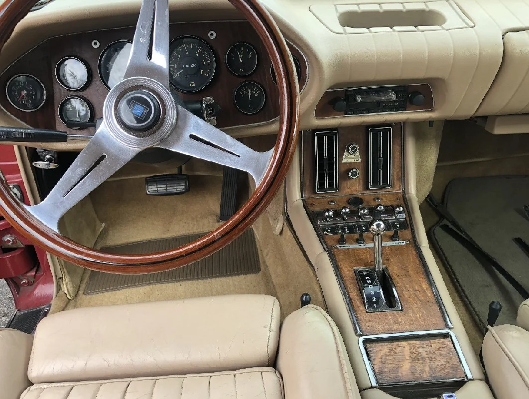 Nardi steering wheel and dash layout inside a 1983 Avanti II.