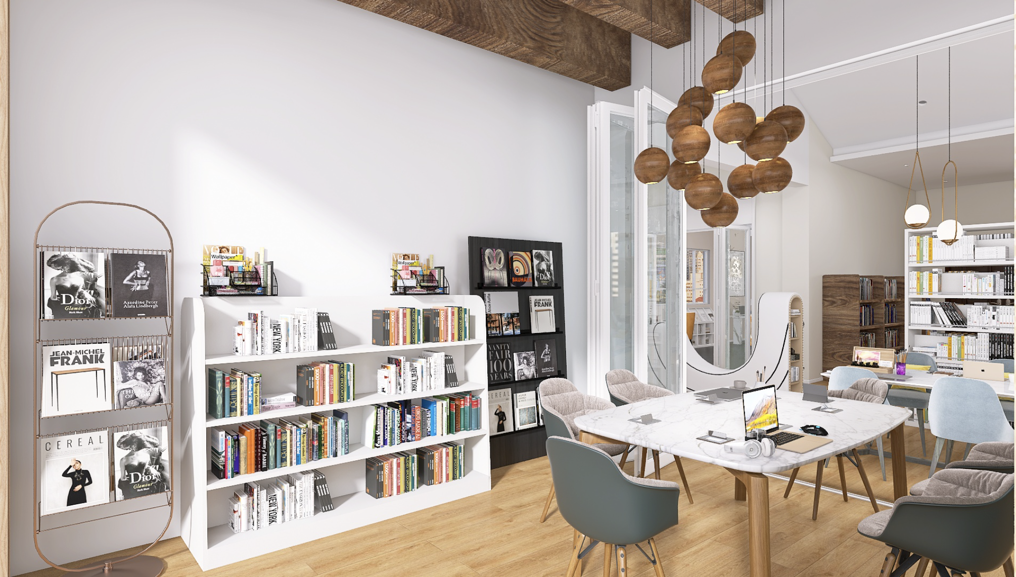 Sala de reuniones con mesa de mármol blanca, varias sillas alrededor, estanterías llenas de libros, decoraciones modernas, una gran lámpara de madera colgante y un espejo decorativo con forma de luna llena.