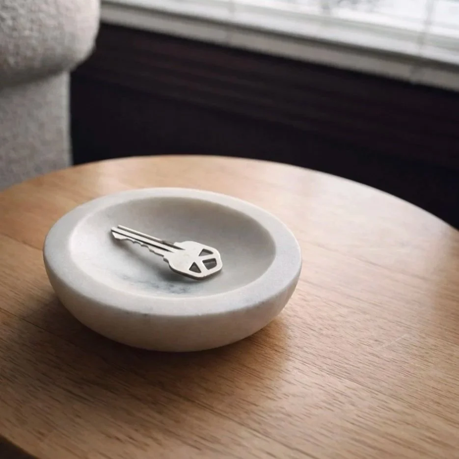 A set of keys representing a successful home closing with Avenue Real Estate Group in Mount Washington, KY.